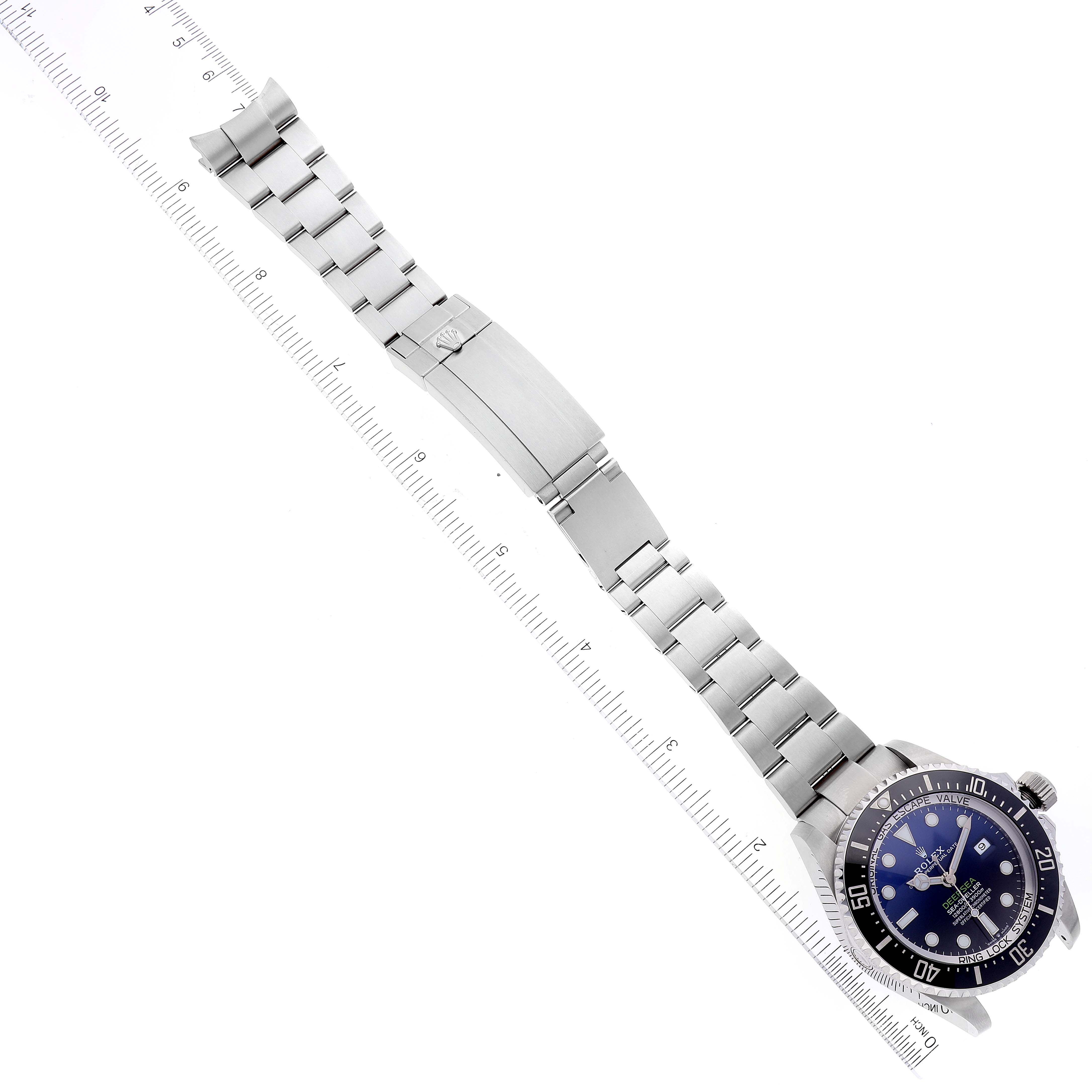 The image displays a top-down view of a Rolex Sea-Dweller 126660 Men's Stainless Steel Blue Dial 126660 Men's Stainless Steel Blue Dial watch, showing the face, bezel, bracelet, and clasp.