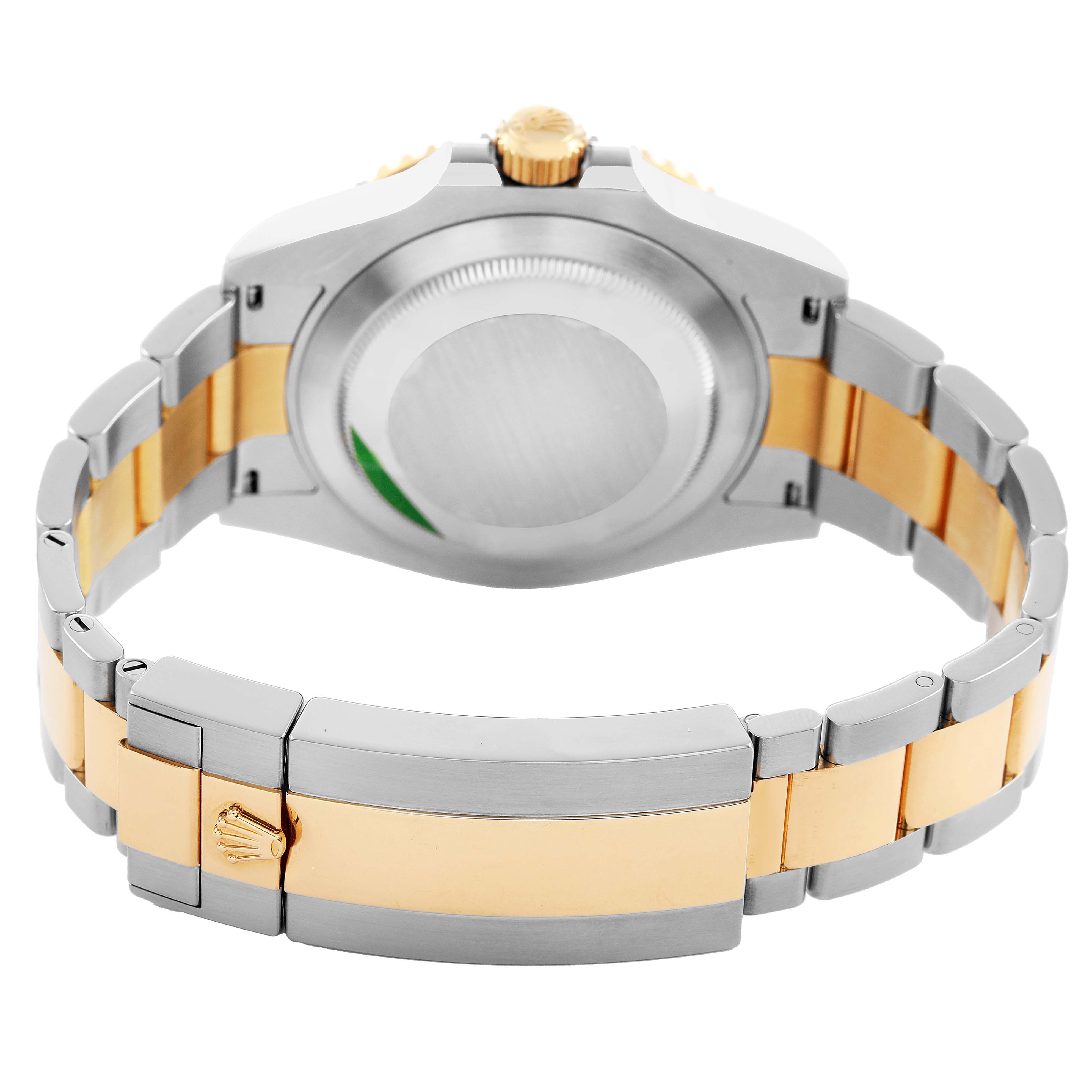 The image shows the back of the Rolex Submariner M126613LN-0002 Men's Steel and Gold (two tone) Black Dial watch, focusing on the case back, bracelet, and clasp.