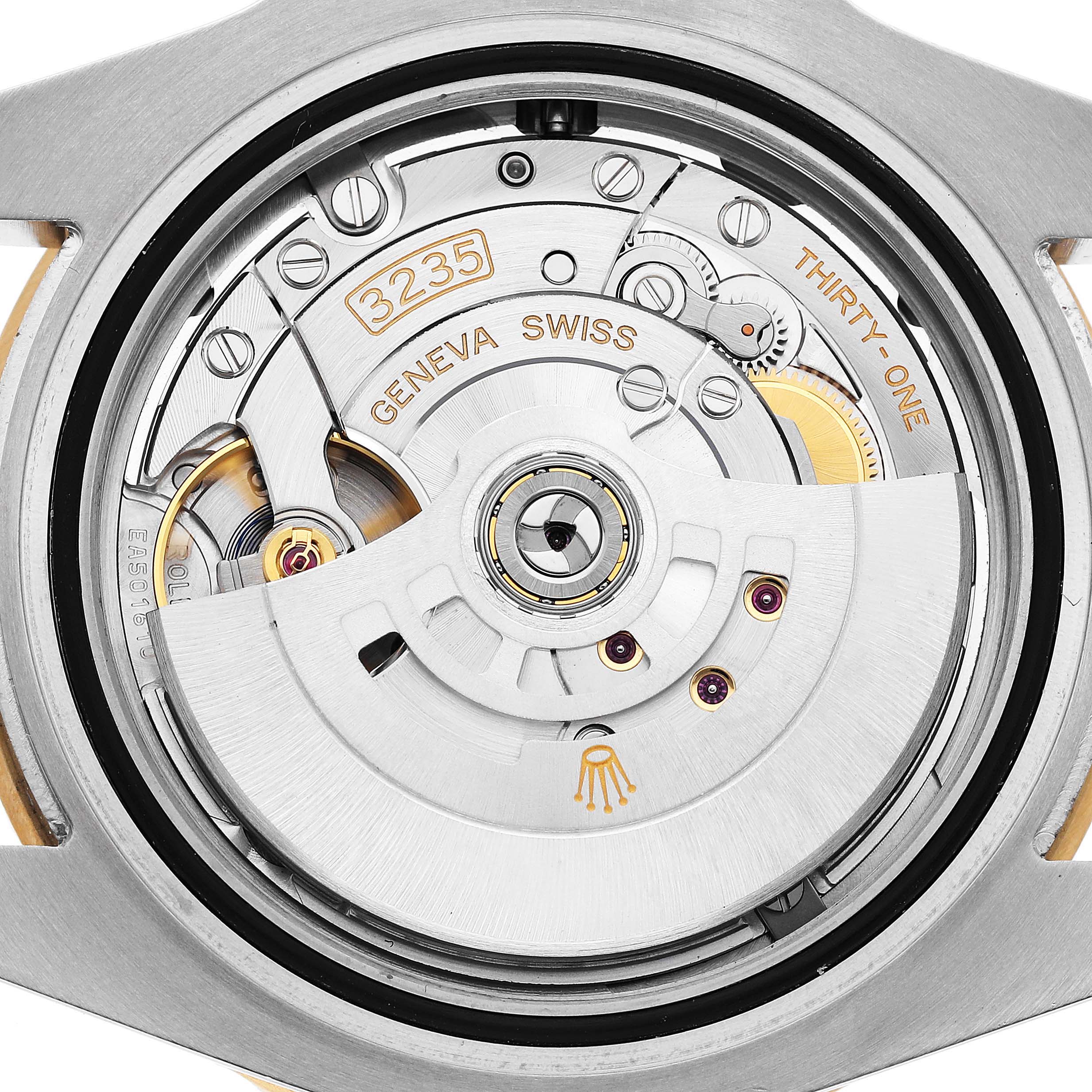 The image shows a close-up of the Rolex Submariner M126613LN-0002 Men's Steel and Gold (two tone) Black Dial's movement, specifically the caliber 3235, showcasing its intricate gear and rotor system.