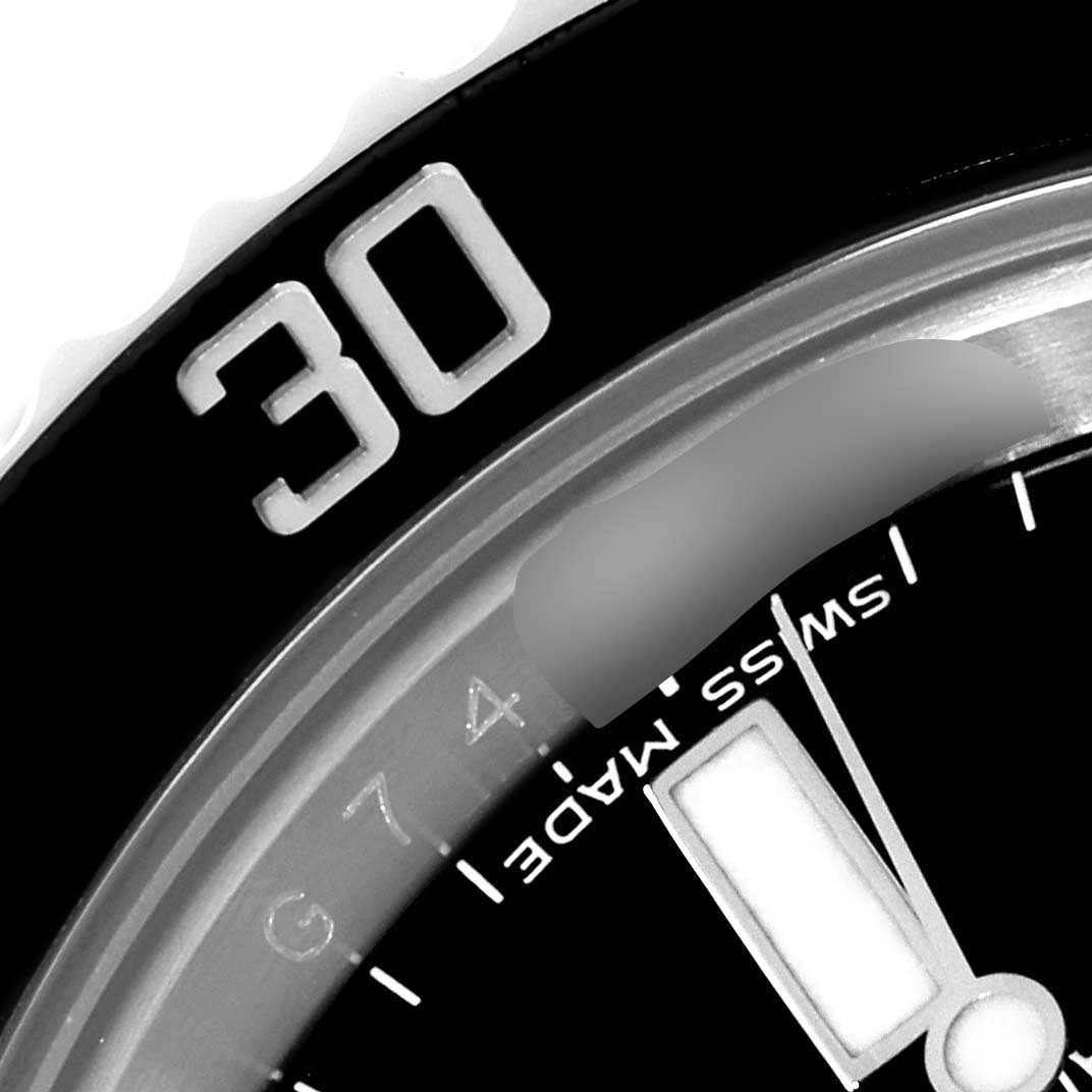 This close-up image showcases the bezel, part of the dial, and the "Swiss Made" text of the Rolex Submariner 116610 Men
s Stainless Steel Black Dial 116610 Men
s Stainless Steel Black Dial watch.