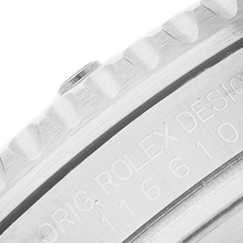 This image shows a close-up side angle of the bezel and engraved edge of the Rolex Submariner 116610 Men
s Stainless Steel Black Dial 116610 Men
s Stainless Steel Black Dial watch.