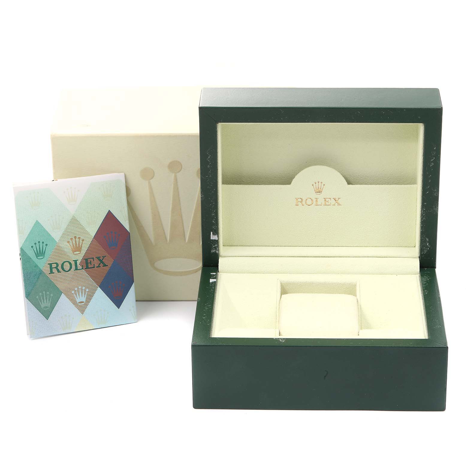 The image shows the packaging, including the box, outer case, and booklet, for a Rolex Submariner 16610 Men
s Stainless Steel Black Dial 16610 Men
s Stainless Steel Black Dial watch.