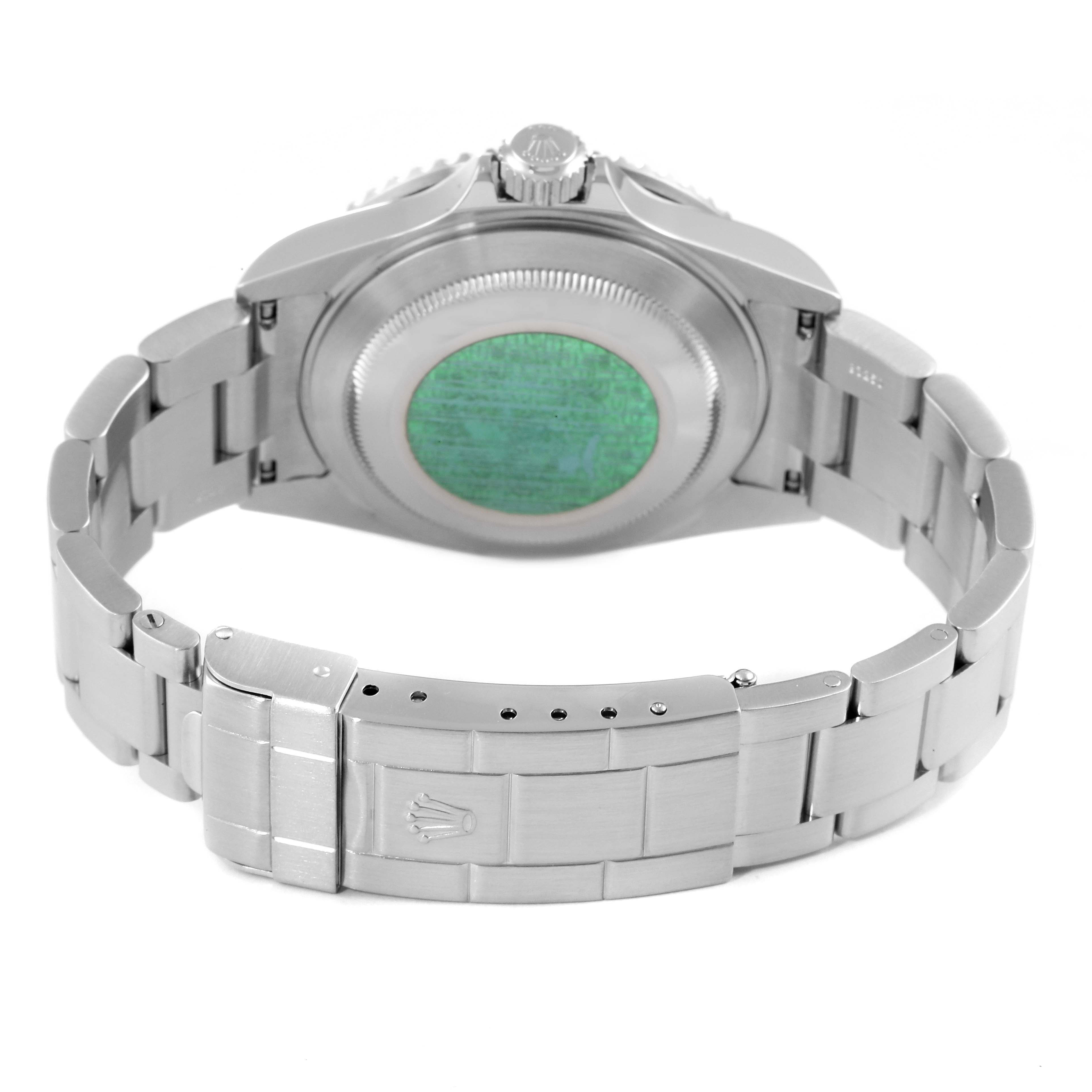 This image shows the back side of a Rolex Submariner 16610 Men
s Stainless Steel Black Dial 16610 Men
s Stainless Steel Black Dial watch, focusing on the clasp, bracelet, and case back.