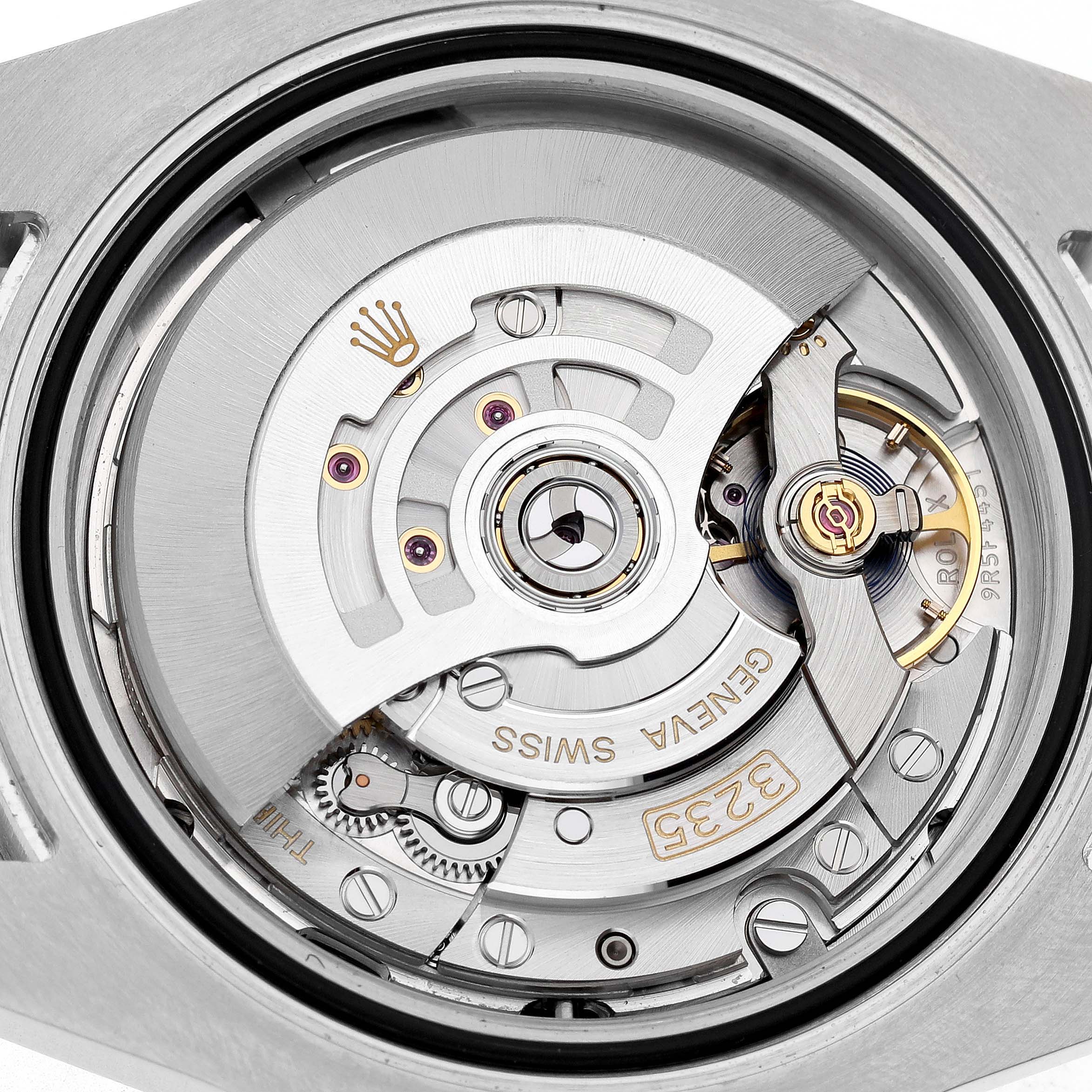 The image shows the movement mechanism of a Rolex Submariner 126610LN Men's Stainless Steel Black Dial watch from the back.