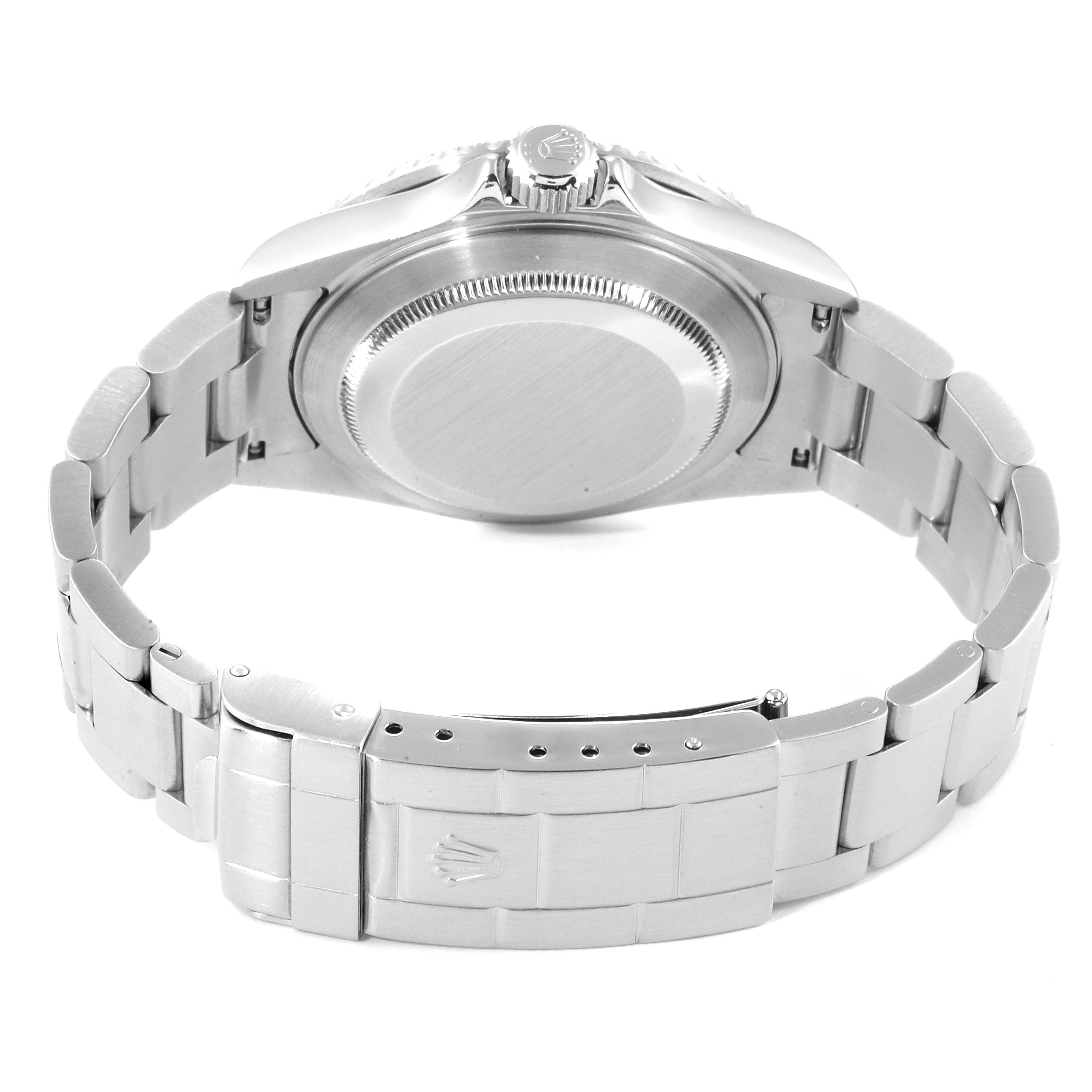 The image shows the back view of a Rolex Submariner 16610 Men's Stainless Steel Black Dial 16610 Men's Stainless Steel Black Dial watch, highlighting the case back, crown, and bracelet clasp.