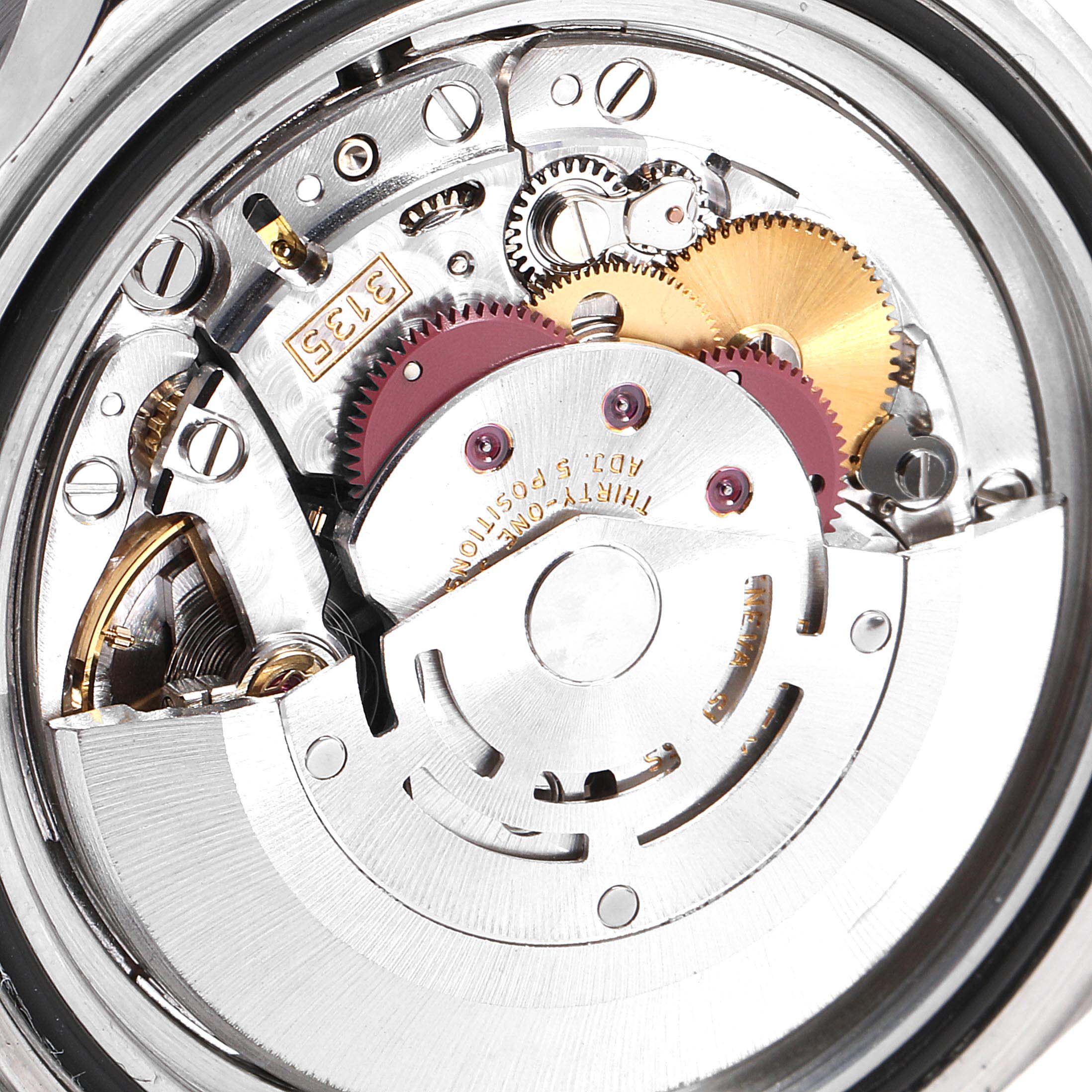 This image shows the internal mechanical movement of the Rolex Submariner 16610 Men's Stainless Steel Black Dial 16610 Men's Stainless Steel Black Dial watch, highlighting the gears and rotor.