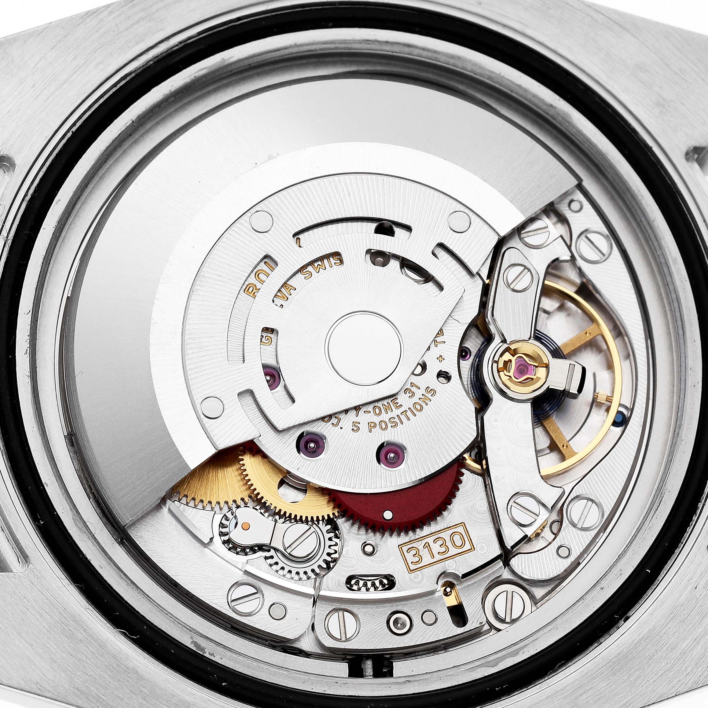 This image shows the movement of a Rolex Submariner 114060 Men's Stainless Steel Black Dial watch, highlighting the intricate gears and components from the back.