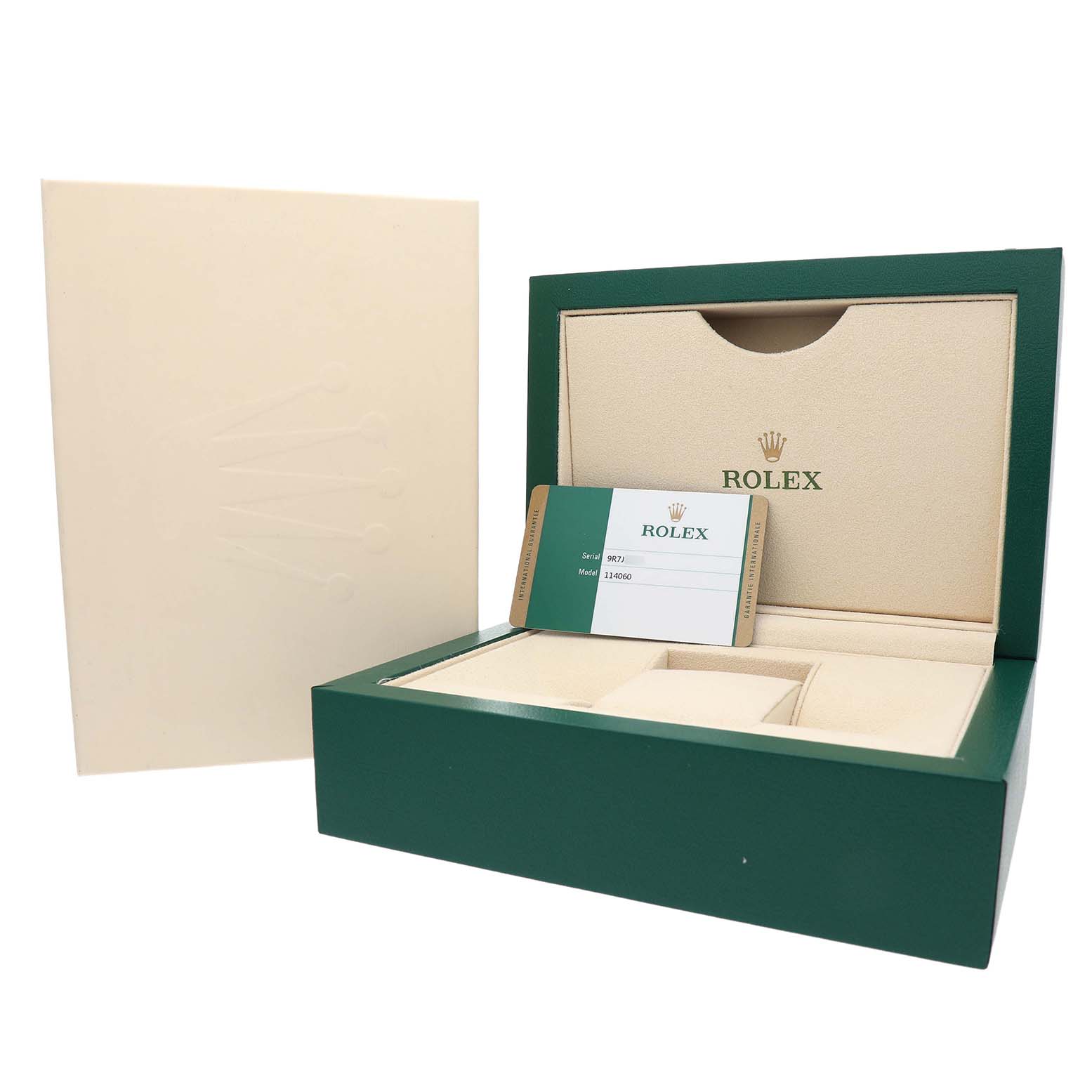 The image shows an open Rolex Submariner 114060 Men's Stainless Steel Black Dial box, revealing the warranty card and compartments inside.