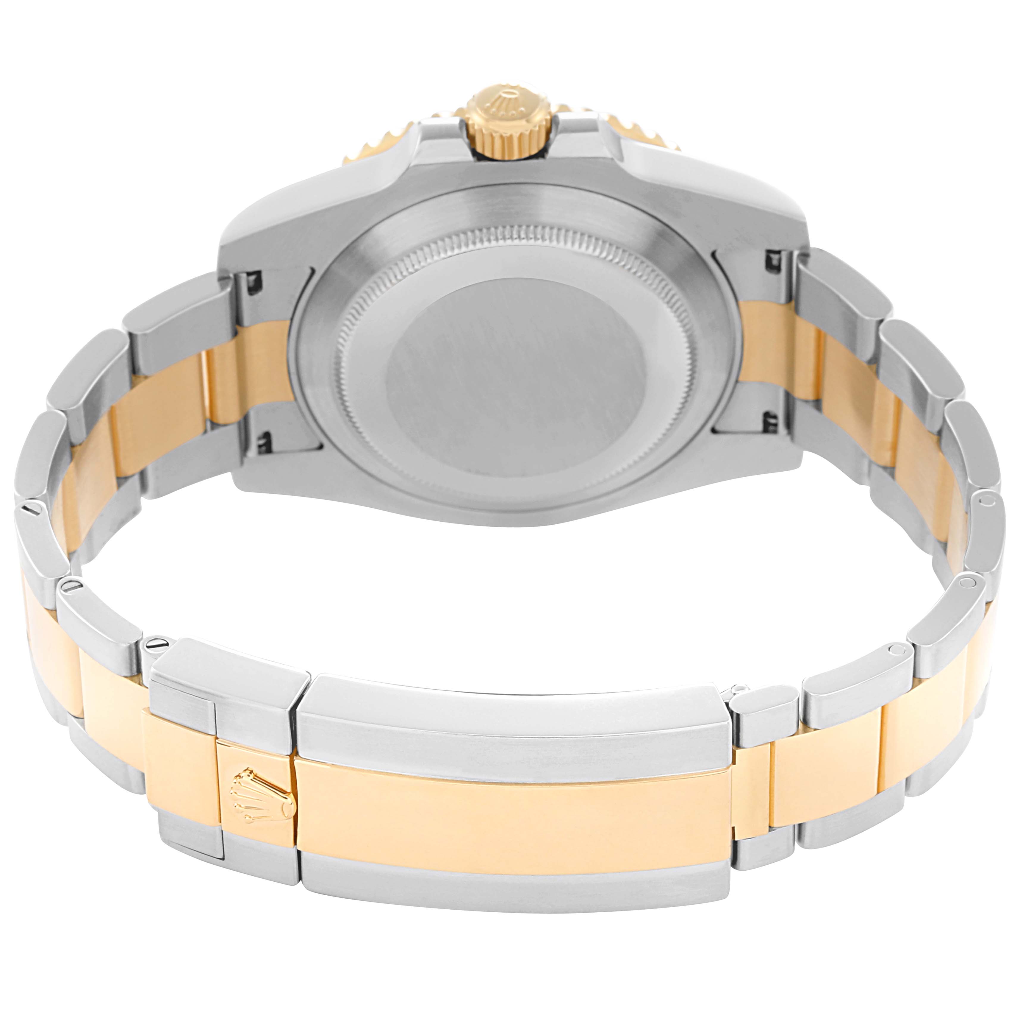 The image shows the back of a Rolex Submariner 116613 Men
s Steel and Gold (two tone) Blue Dial 116613 Men
s Steel and Gold (two tone) Blue Dial watch, highlighting the case back, crown, and two-tone bracelet.