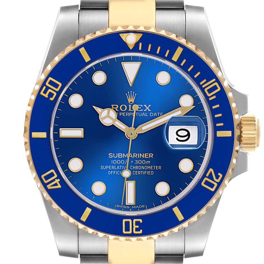 The Rolex Submariner watch is shown from the front, highlighting the blue dial, bezel, and gold and silver bracelet.