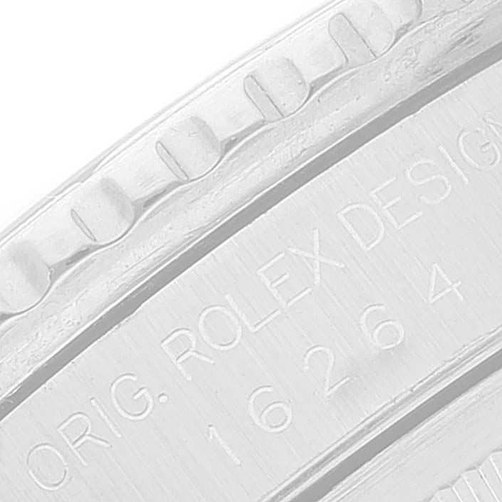 This close-up image shows the engraved details on the casing of a Rolex Turn-o-Graph 16264 Men
s Stainless Steel Black Dial 16264 Men
s Stainless Steel Black Dial model watch.
