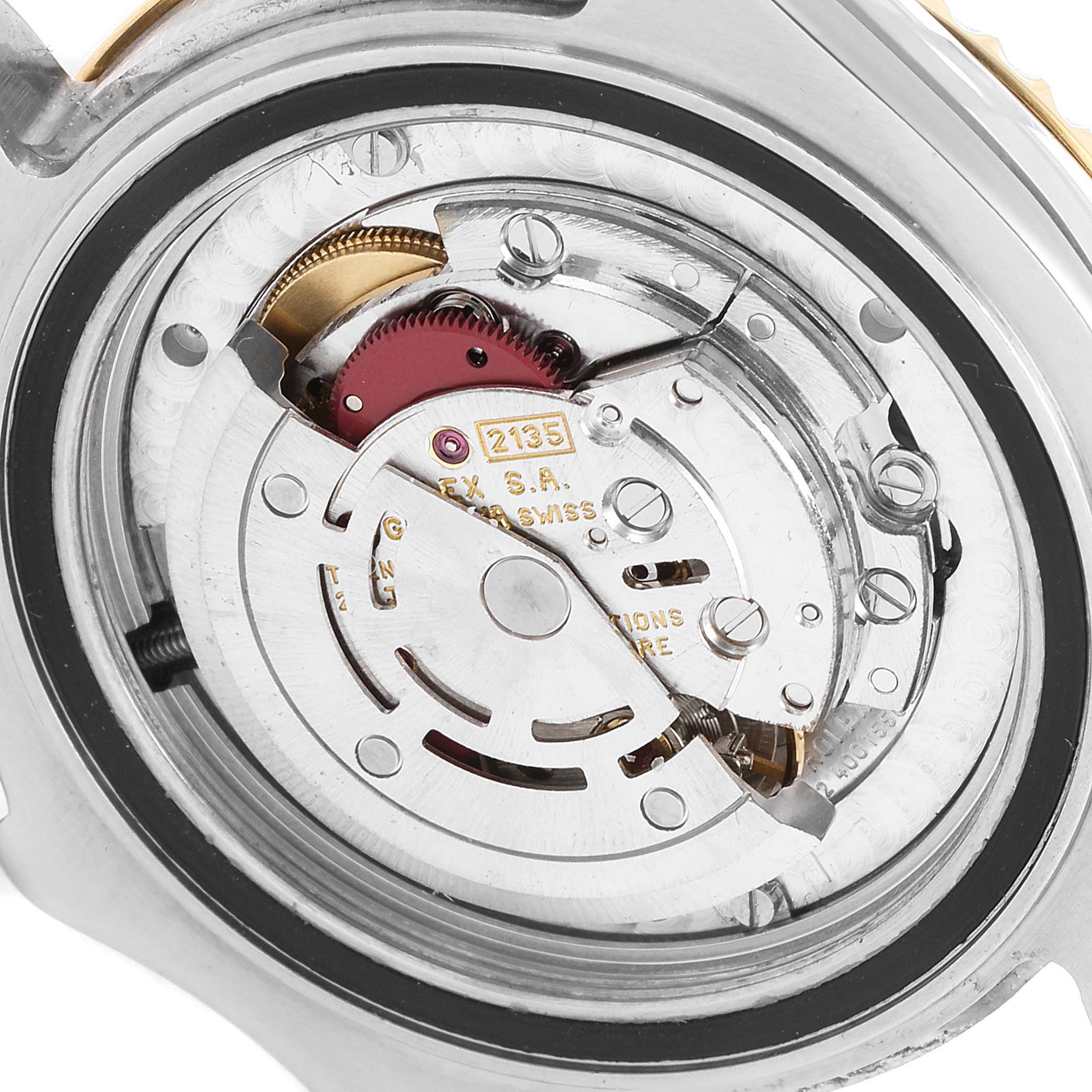 The image shows a close-up of the internal movement mechanism of a Rolex Yacht-Master 68623 Men
s Steel and Gold (two tone) White Dial 68623 Men
s Steel and Gold (two tone) White Dial watch.