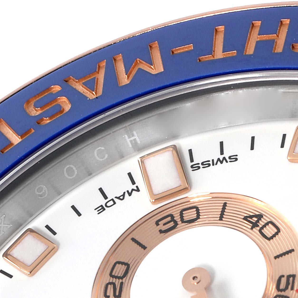 The image shows a partial close-up of the dial and bezel of the Rolex Yacht-Master 116681 Men
s Steel and Gold (two tone) White Dial 116681 Men
s Steel and Gold (two tone) White Dial watch.