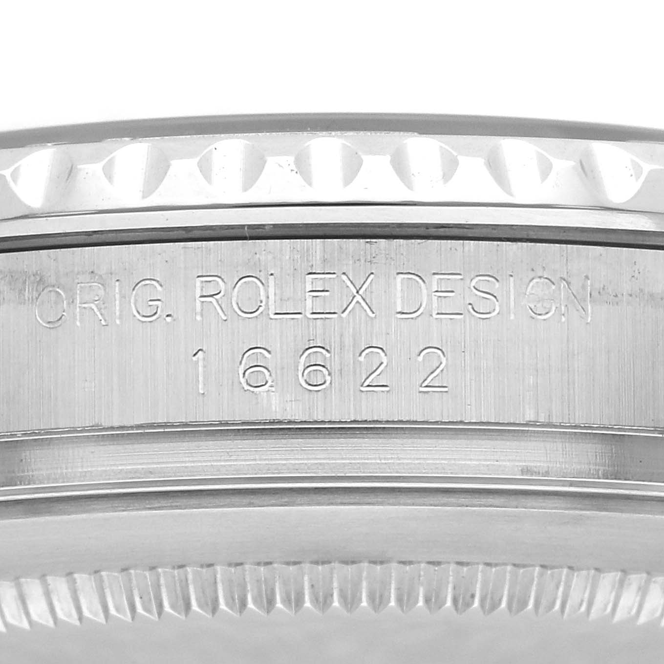 The image shows a close-up of the bezel and edge of the case of a Rolex Yacht-Master 16622 Men
s Stainless Steel Grey Dial 16622 Men
s Stainless Steel Grey Dial, displaying "ORIG. ROLEX DESIGN 16622."