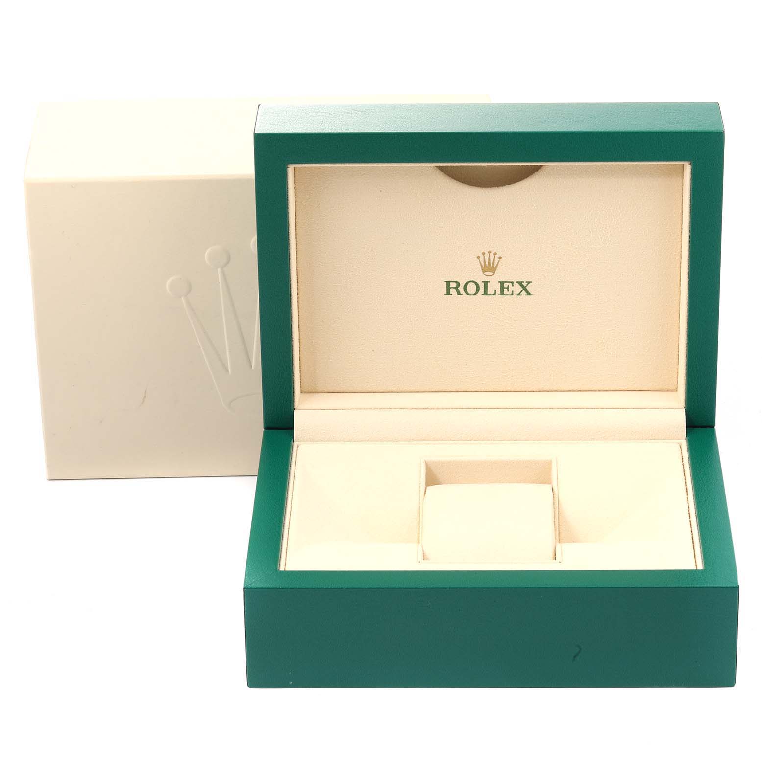 The image shows an open green and beige Rolex box for the Yacht-Master model, showcasing the storage compartments and the outer box.