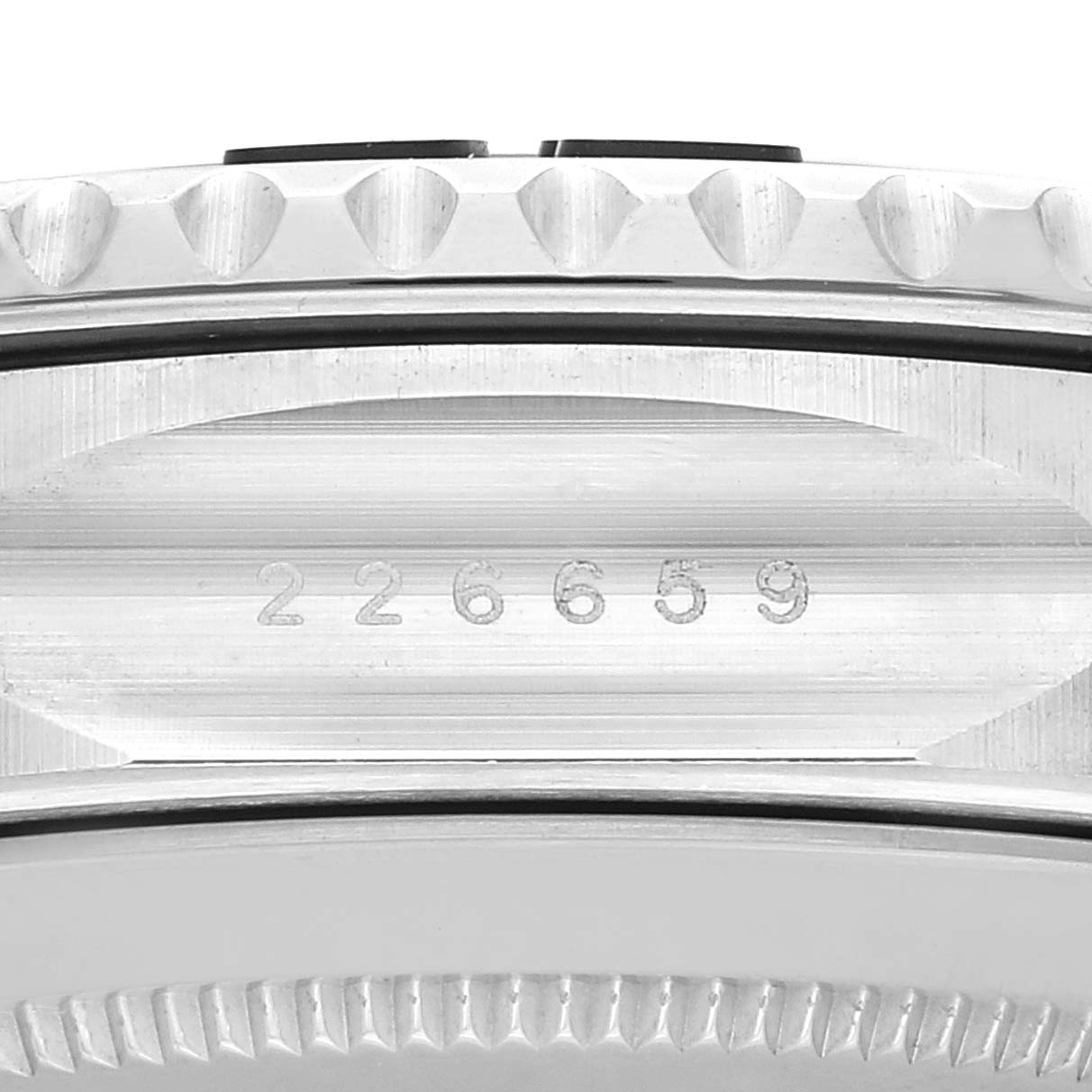The image shows a close-up of the serial number engraved on the case side of a Rolex Yacht-Master 226659 Men's White Gold Black Dial 226659 Men's White Gold Black Dial watch.