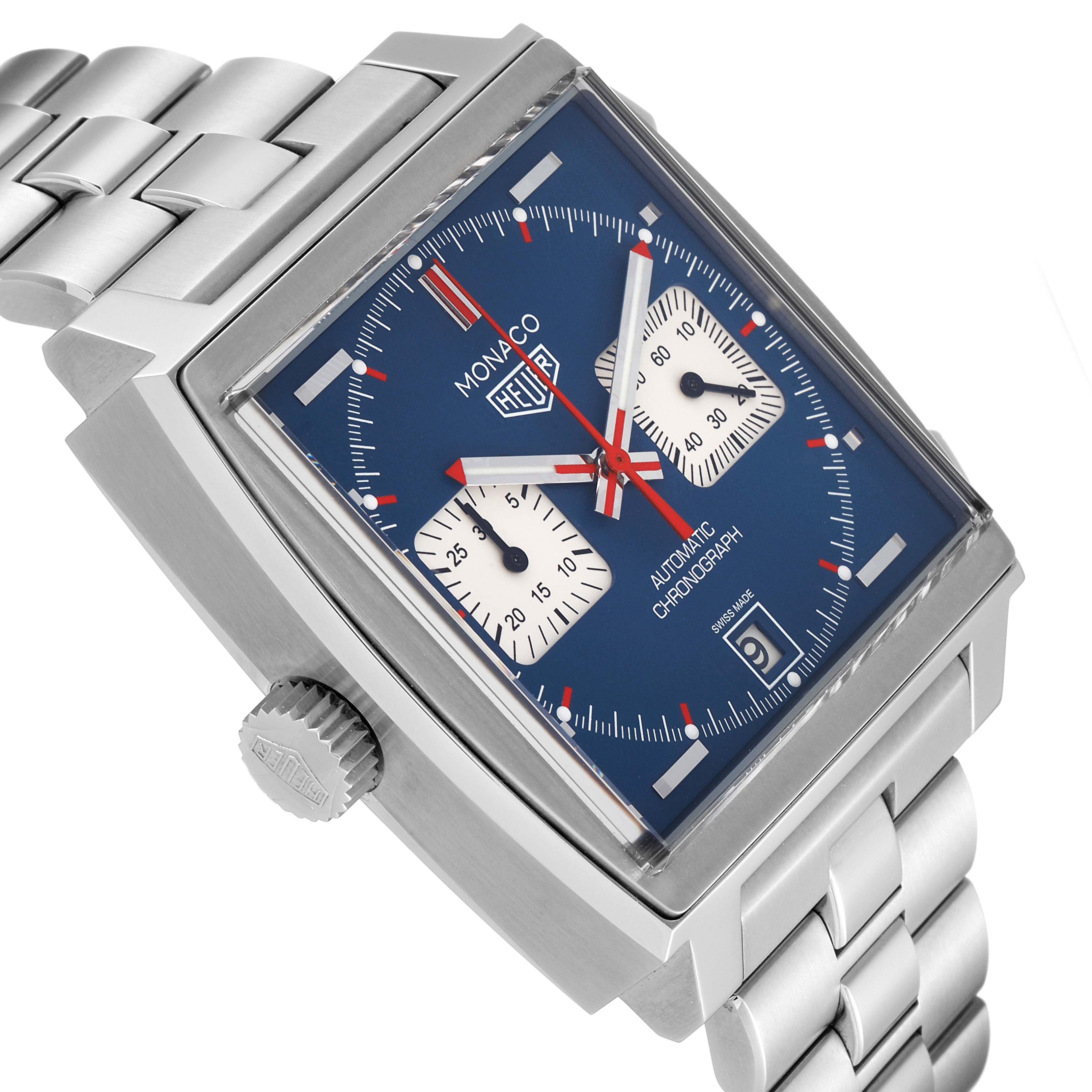 The image shows a side angle of the Tag Heuer Monaco CAW211P Men
s Stainless Steel Blue Dial CAW211P Men
s Stainless Steel Blue Dial watch, highlighting its stainless steel bracelet, blue dial, and crown.