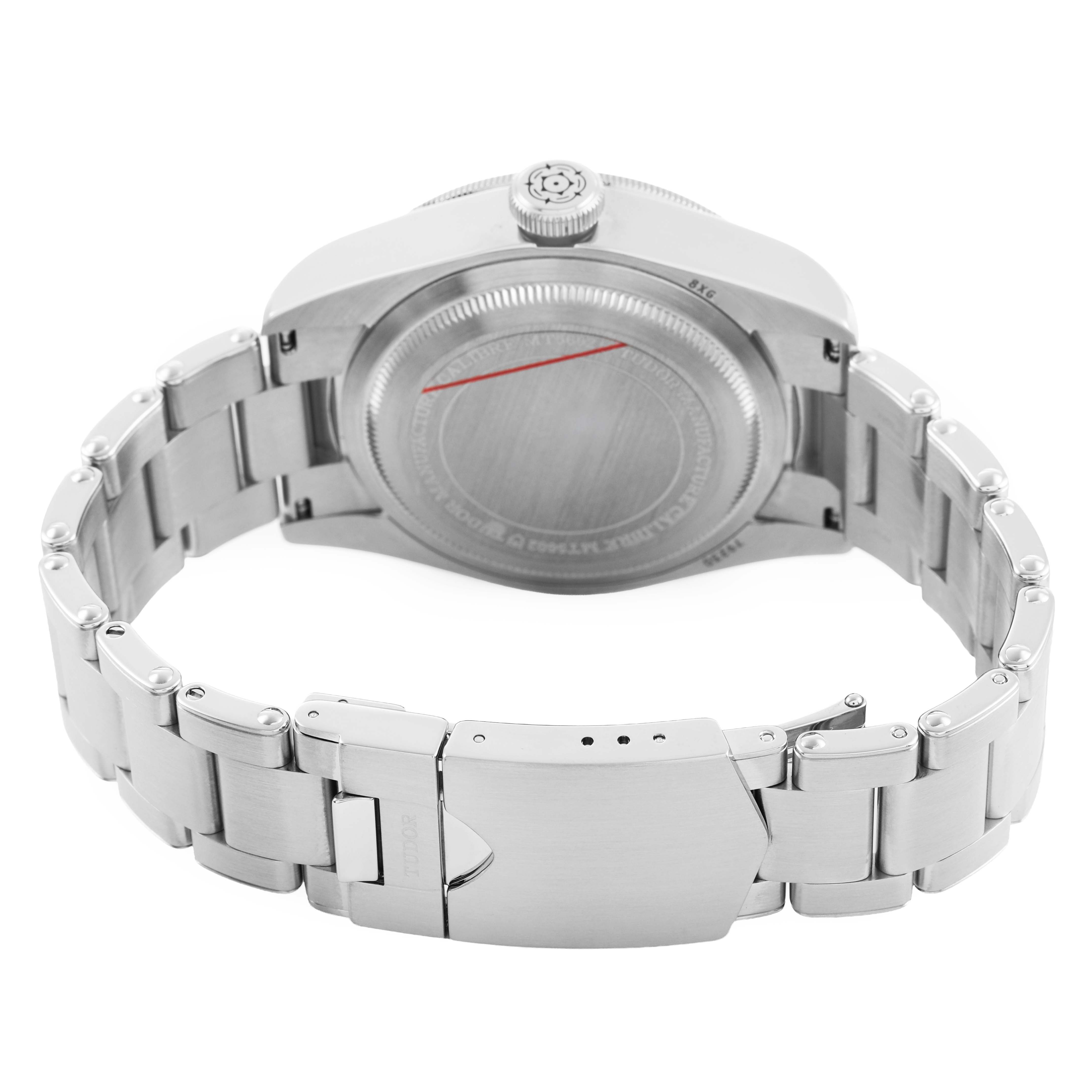 The watch is shown from the back, highlighting the case back, crown, and metal bracelet of the Tudor Heritage Black Bay 79230B Men's Stainless Steel Black Dial model.