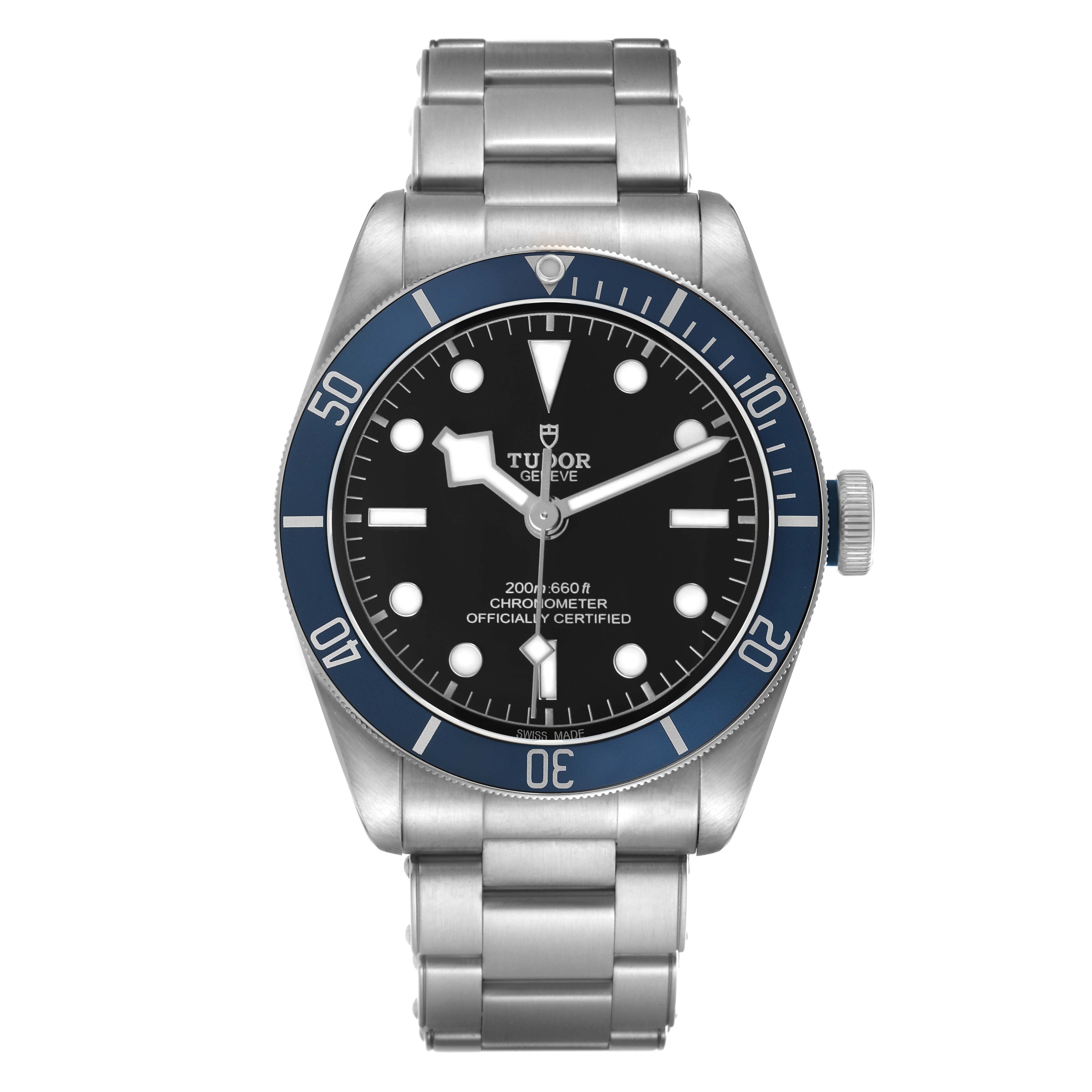 The Tudor Heritage Black Bay 79230B Men's Stainless Steel Black Dial watch is shown from a frontal angle, displaying the dial, bezel, and bracelet.