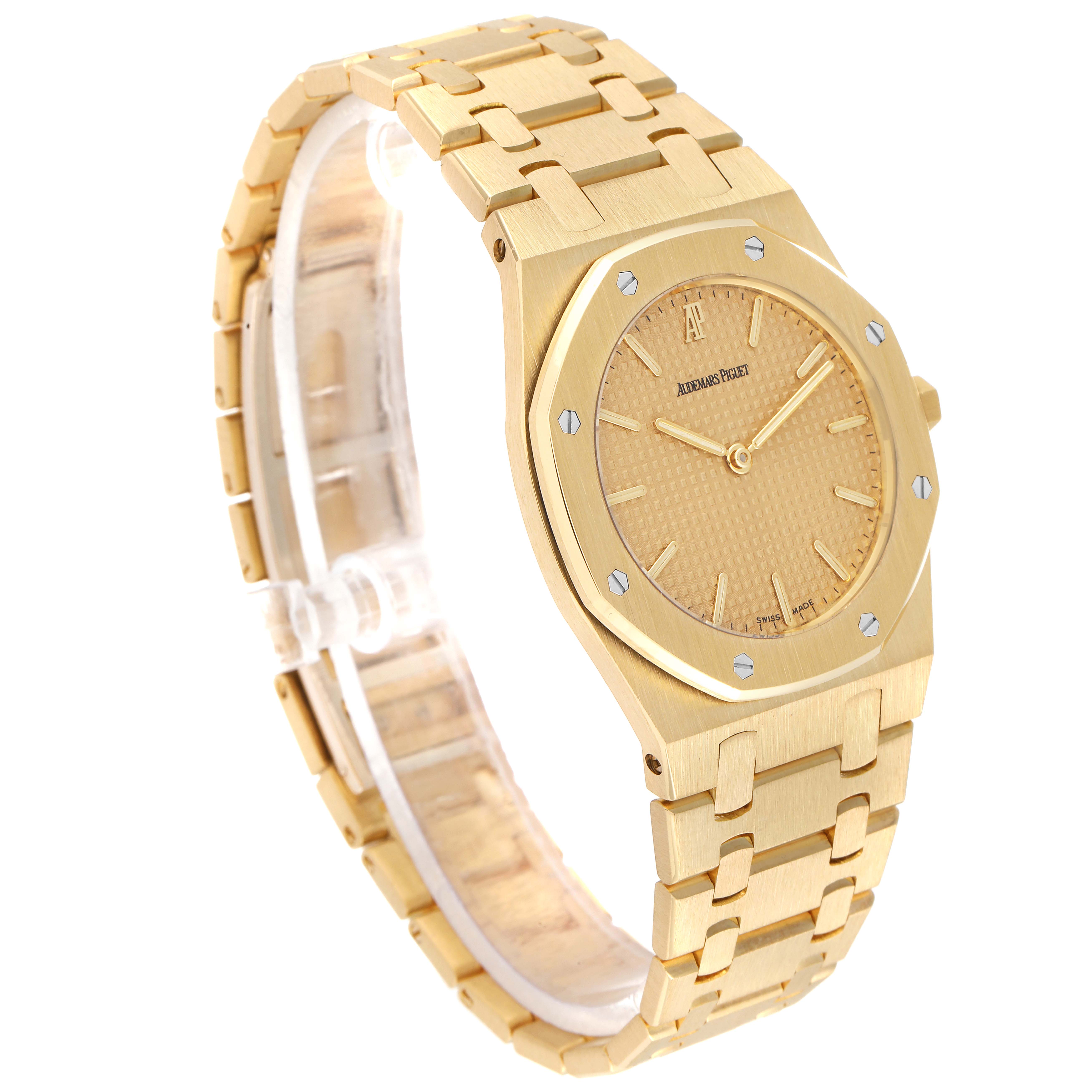The image shows a side view of a Royal Oak model by Audemars Piguet, highlighting the bracelet and case.