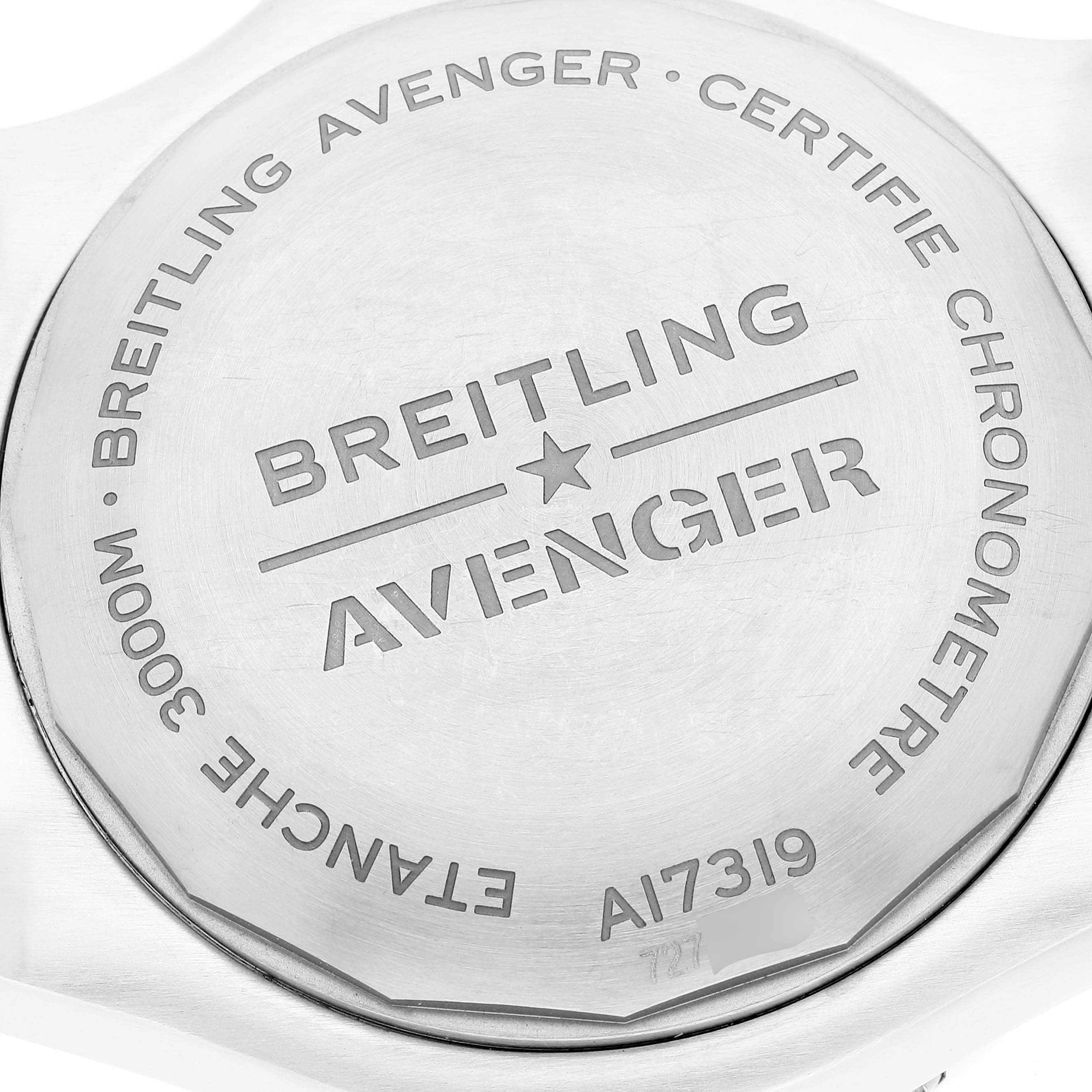This image shows the back case of a Breitling Avenger A17319 Men's Stainless Steel Yellow Dial A17319 Men's Stainless Steel Yellow Dial watch, displaying model details and engravings.