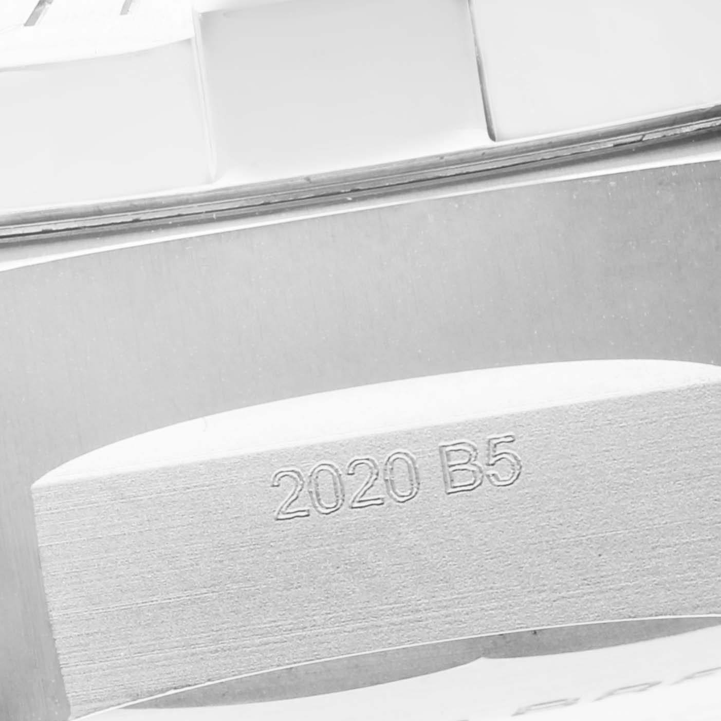 The image shows a close-up of the side profile of a Breitling Avenger A17319 Men's Stainless Steel Yellow Dial A17319 Men's Stainless Steel Yellow Dial watch, highlighting the engraved "2020 B5" marking.