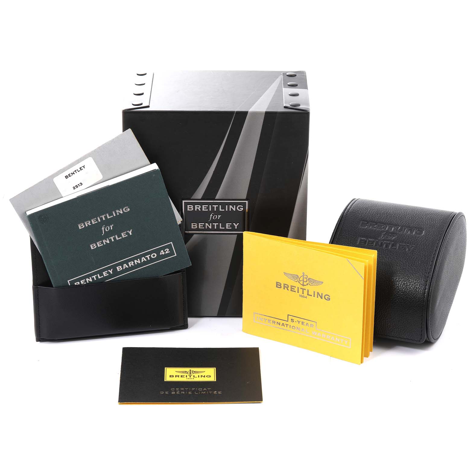 The image shows the packaging, booklets, and leather case for the Bentley model watch by Breitling.