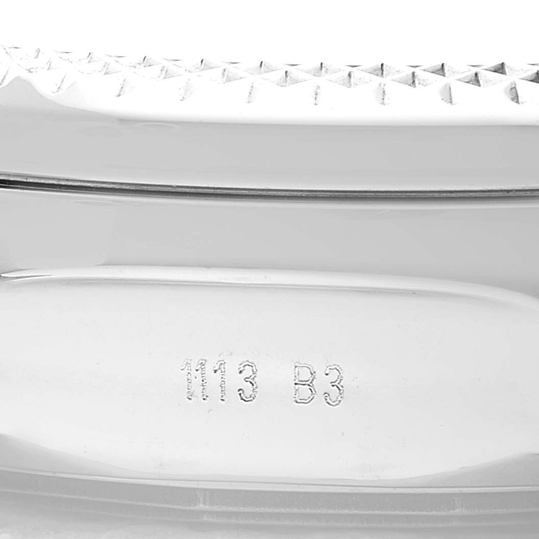 This close-up image shows the side of the bezel and casing of the Breitling Bentley A41390 Men's Stainless Steel Silver Dial A41390 Men's Stainless Steel Silver Dial watch, including its serial number.