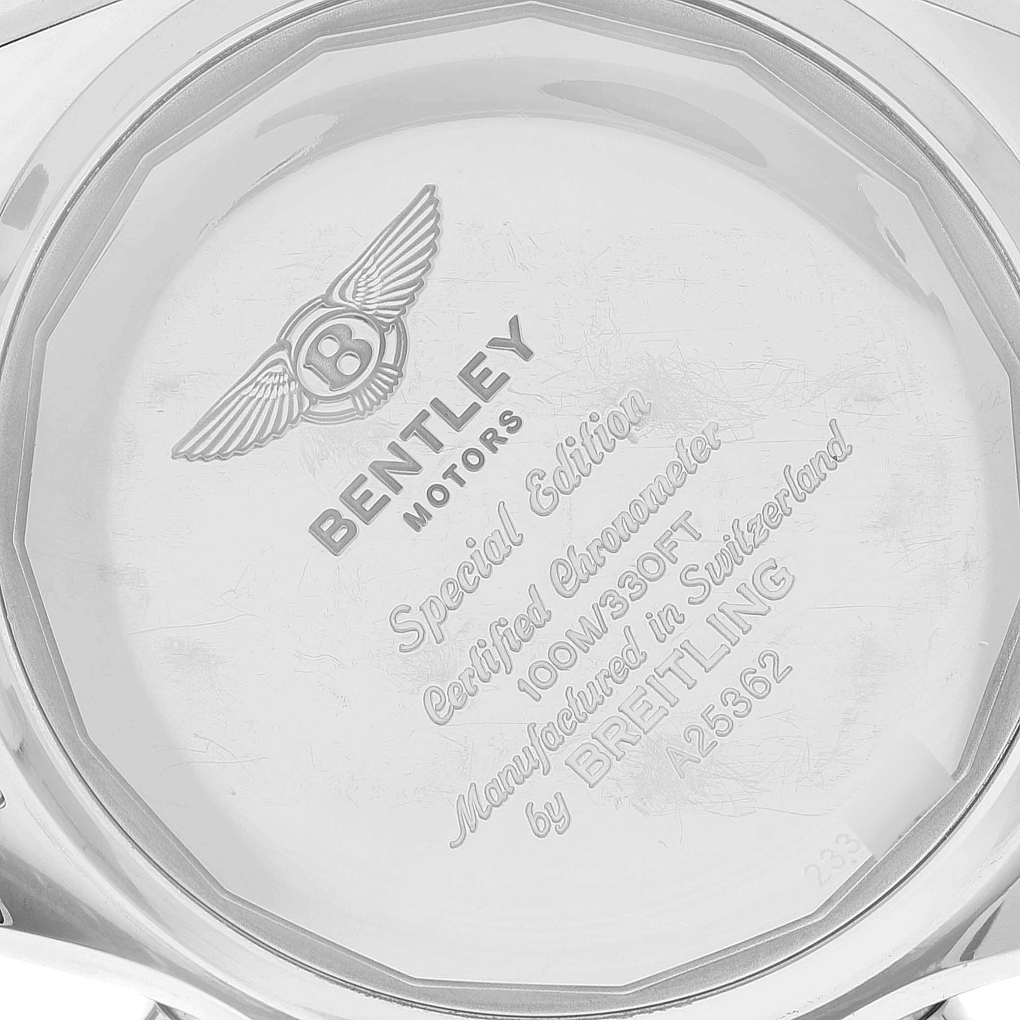 The image shows the back casing of a Bentley model watch by Breitling, featuring branding and watch details engraved.
