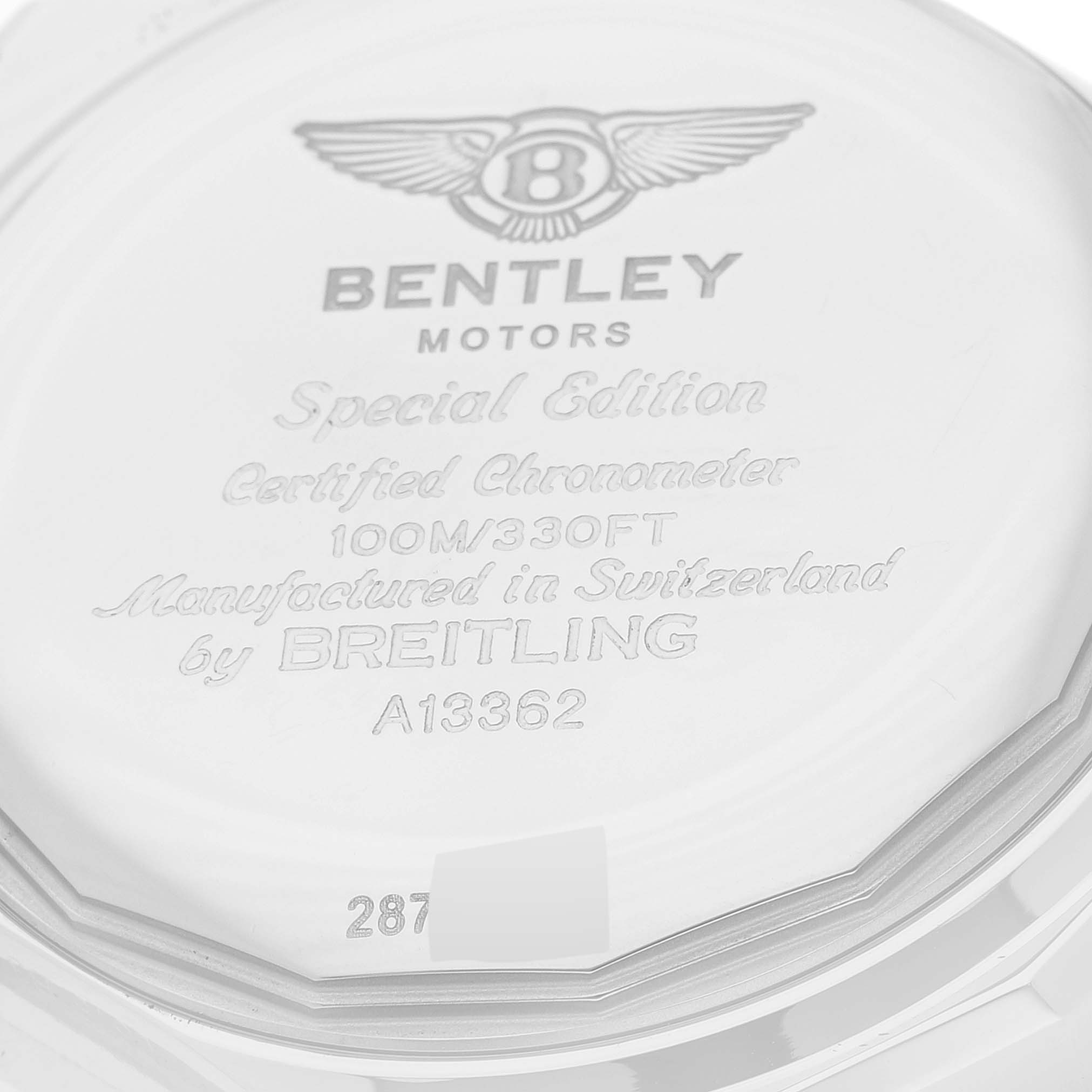 This image shows the back case of the Bentley model by Breitling, highlighting the engraved brand, model, and specifications.