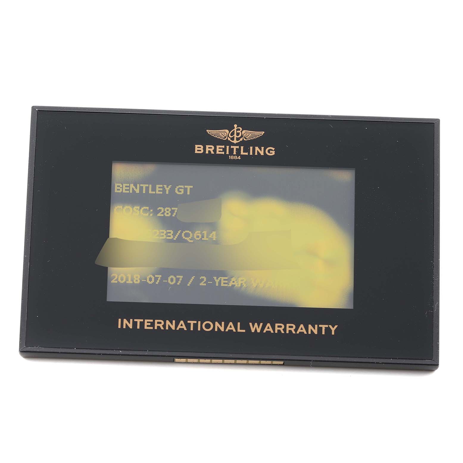 This image shows an international warranty card for the Bentley model watch by Breitling.