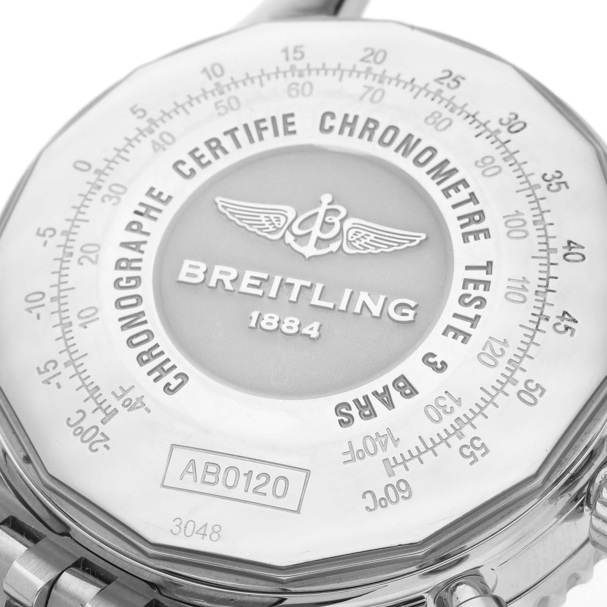 The image shows the backside of a Breitling Navitimer AB0120 Men
s Stainless Steel Black Dial AB0120 Men
s Stainless Steel Black Dial watch with branding and specifications engraved.