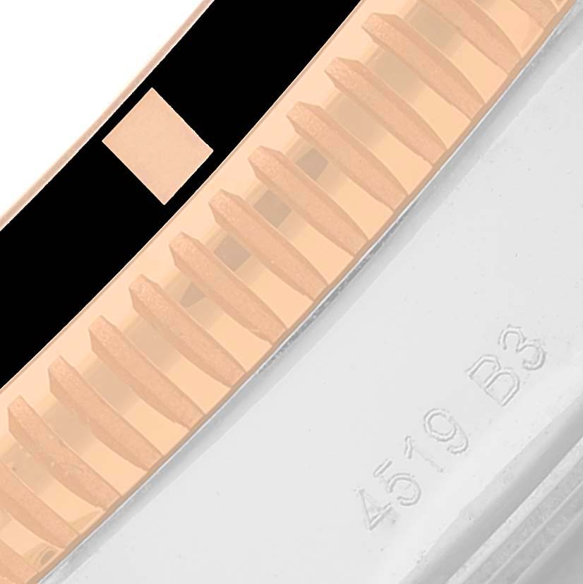 This is a close-up of the bezel's edge and part of the case of a Breitling Superocean UB2030121B1A1 Men's Steel and Gold (two tone) Black Dial UB2030121B1A1 Men's Steel and Gold (two tone) Black Dial watch.