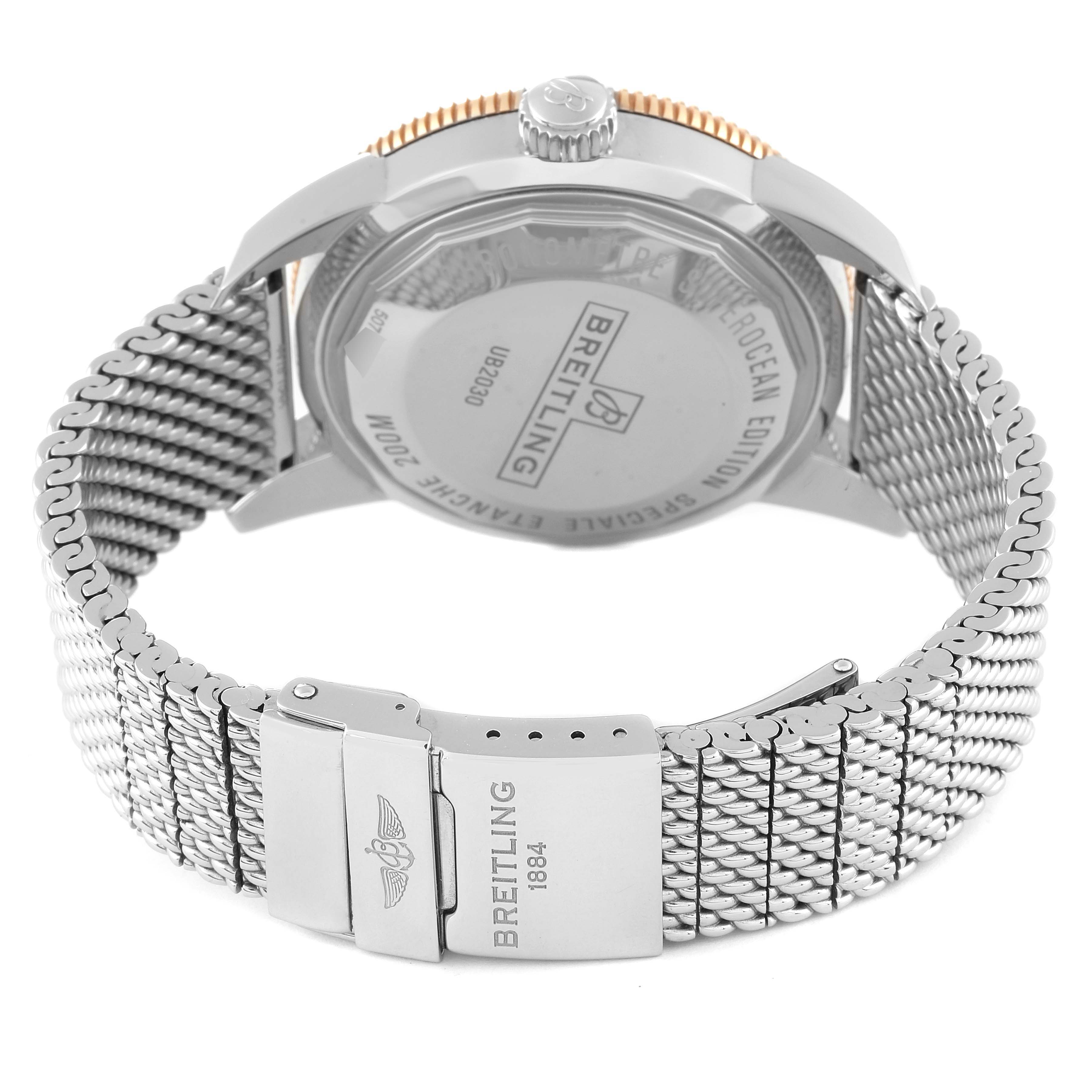 The image shows the back case and mesh bracelet with a clasp of a Breitling Superocean UB2030121B1A1 Men's Steel and Gold (two tone) Black Dial UB2030121B1A1 Men's Steel and Gold (two tone) Black Dial watch.