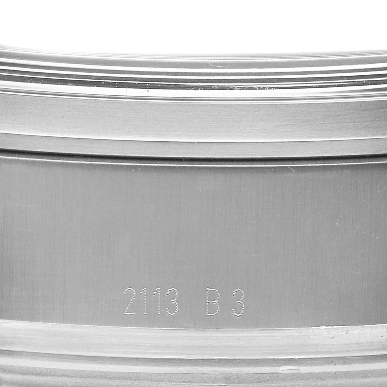 The image shows the side of the Breitling Transocean AB0510U9/C879 Men's Stainless Steel Blue Dial AB0510U9/C879 Men's Stainless Steel Blue Dial watch case, featuring engraved numbers.