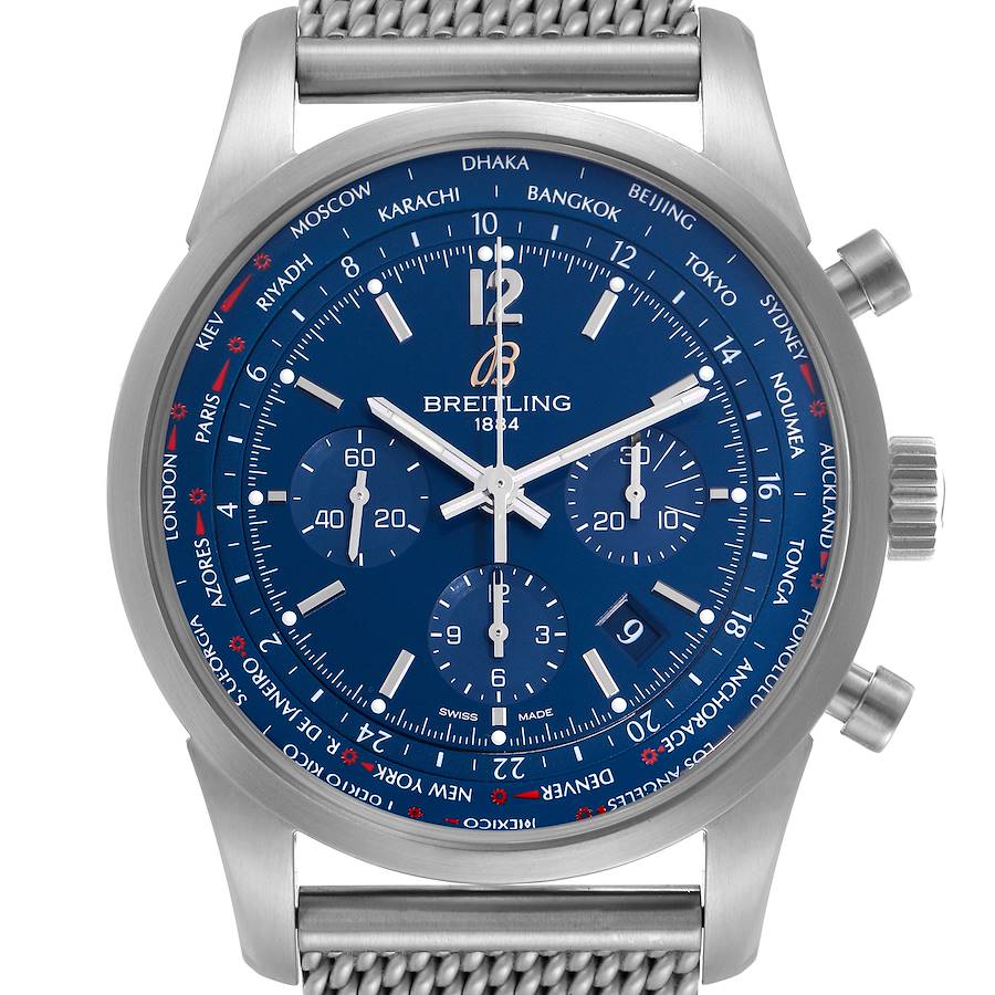 The Breitling Transocean watch is shown from the front, displaying its blue dial and stainless steel bracelet.