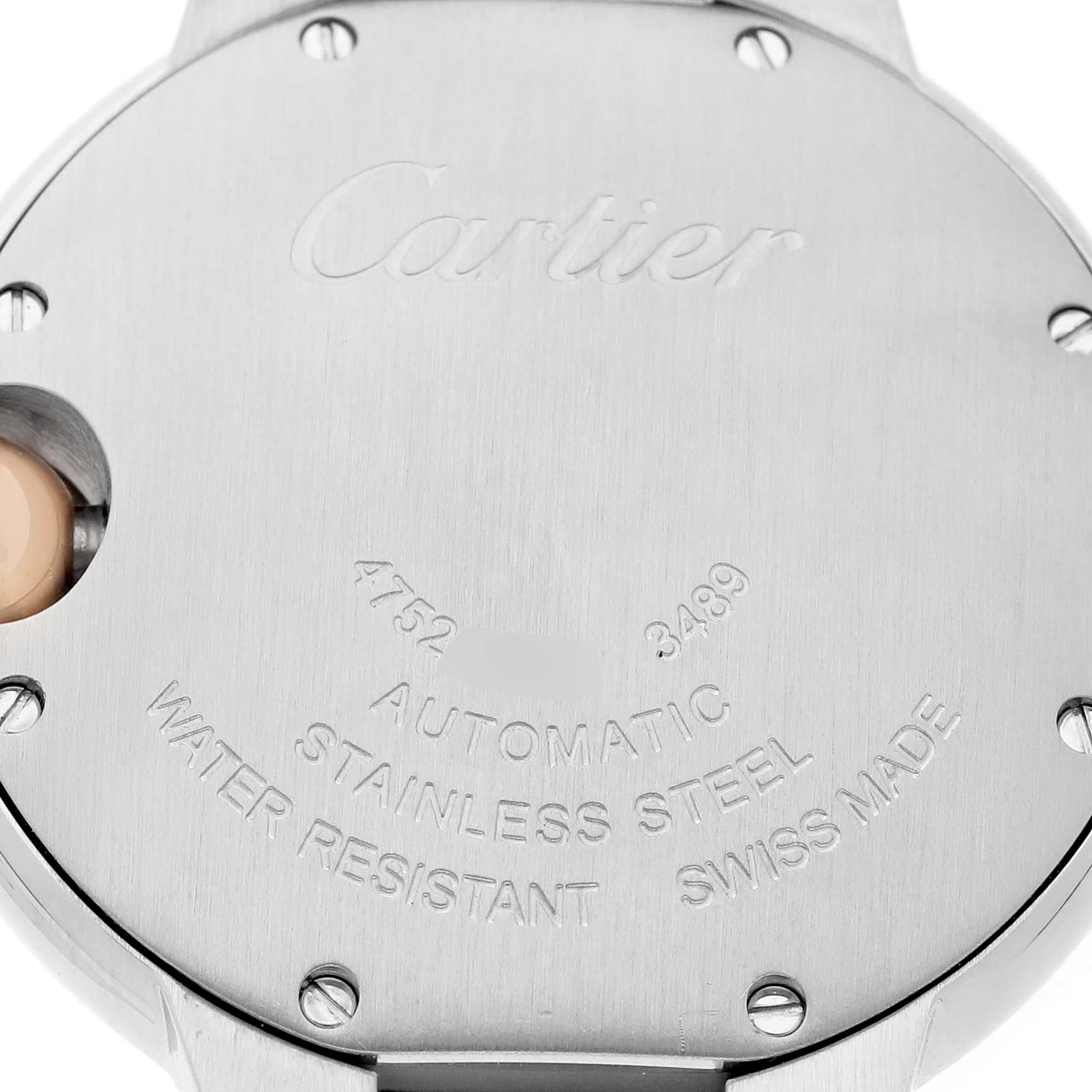 The image shows the back of a Cartier Ballon Bleu W6920070 Women's Steel and Gold (two tone) Mother of Pearl Dial watch, highlighting engravings and screws.