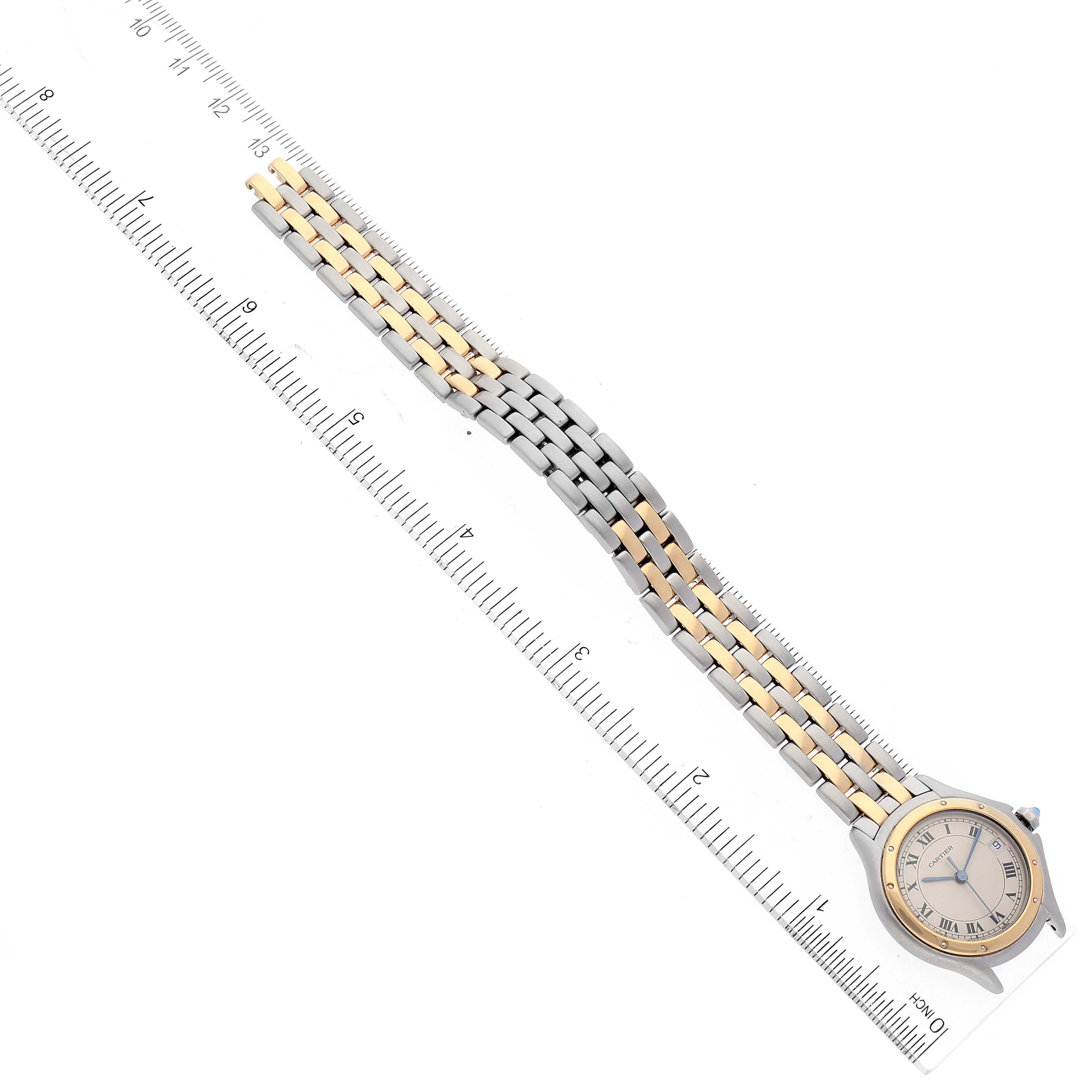 The Cartier Panthere W35005B6 Women's Steel and Gold (two tone) Silver Dial W35005B6 Women's Steel and Gold (two tone) Silver Dial watch is shown flat with its dial and bracelet visible, placed alongside a ruler for scale.