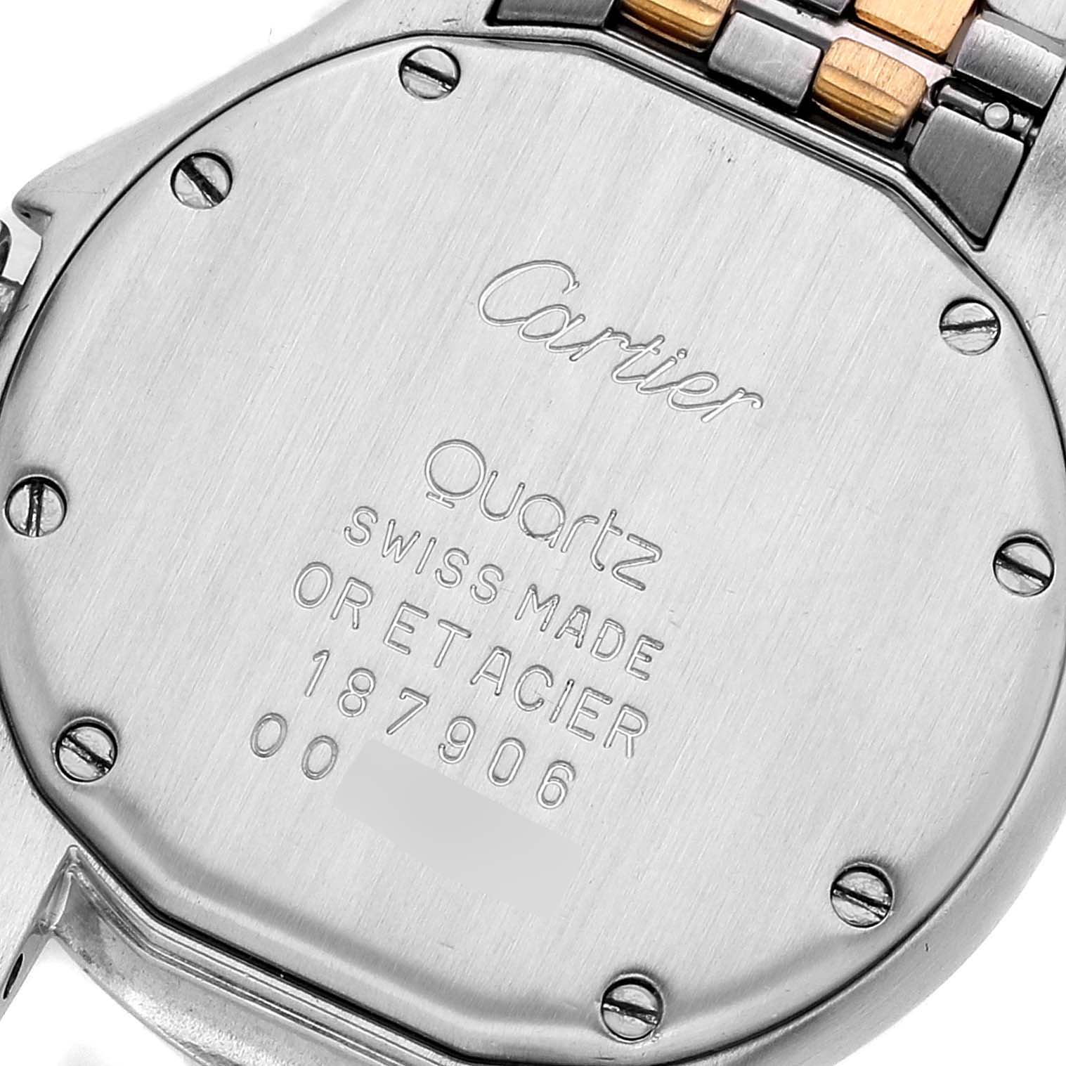 The image shows the back case of a Cartier Panthere W35005B6 Women's Steel and Gold (two tone) Silver Dial W35005B6 Women's Steel and Gold (two tone) Silver Dial watch, featuring its inscriptions and screws.