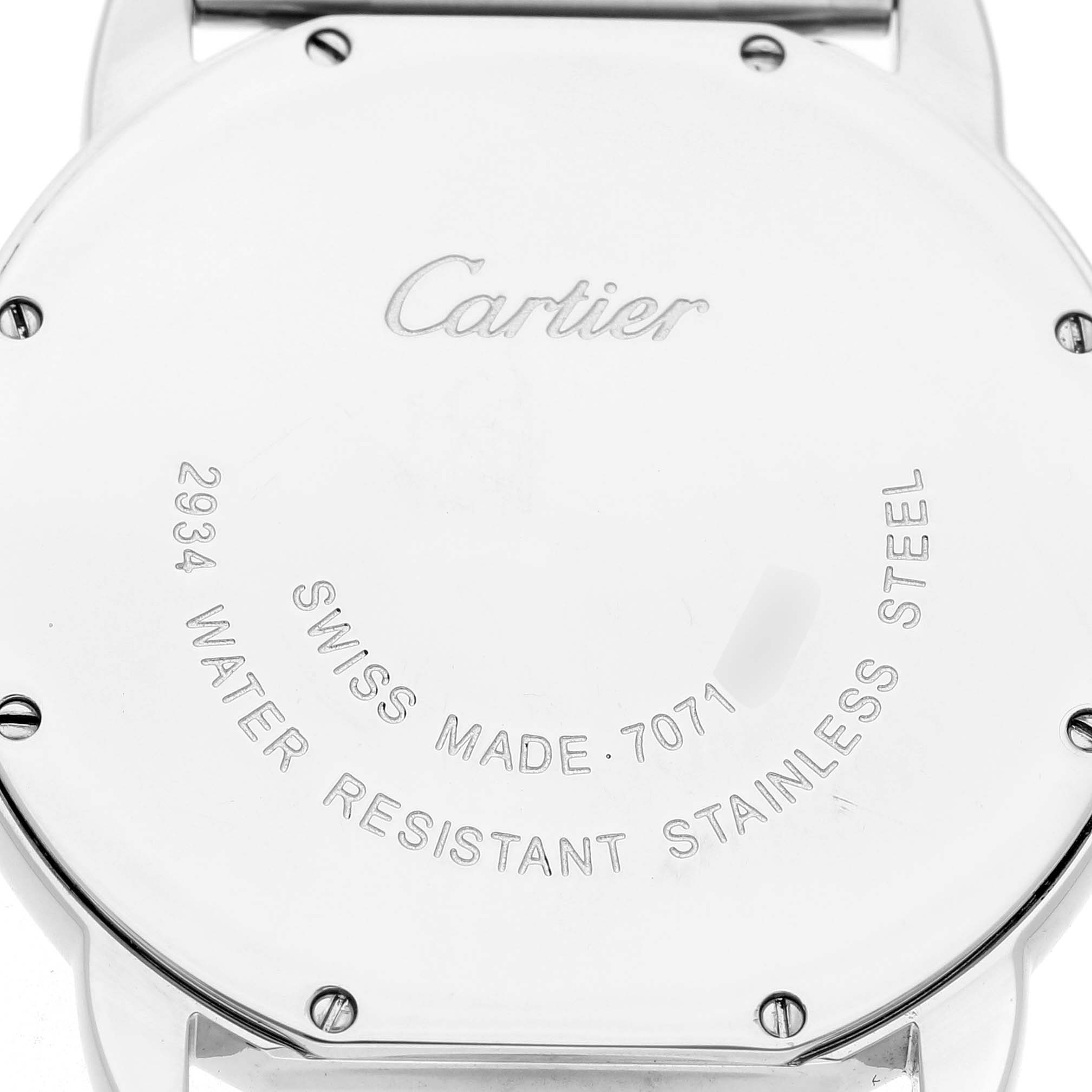 The image shows the back case of a Cartier Ronde W6701005 Men's Stainless Steel Silver Dial watch, displaying inscriptions and screws.