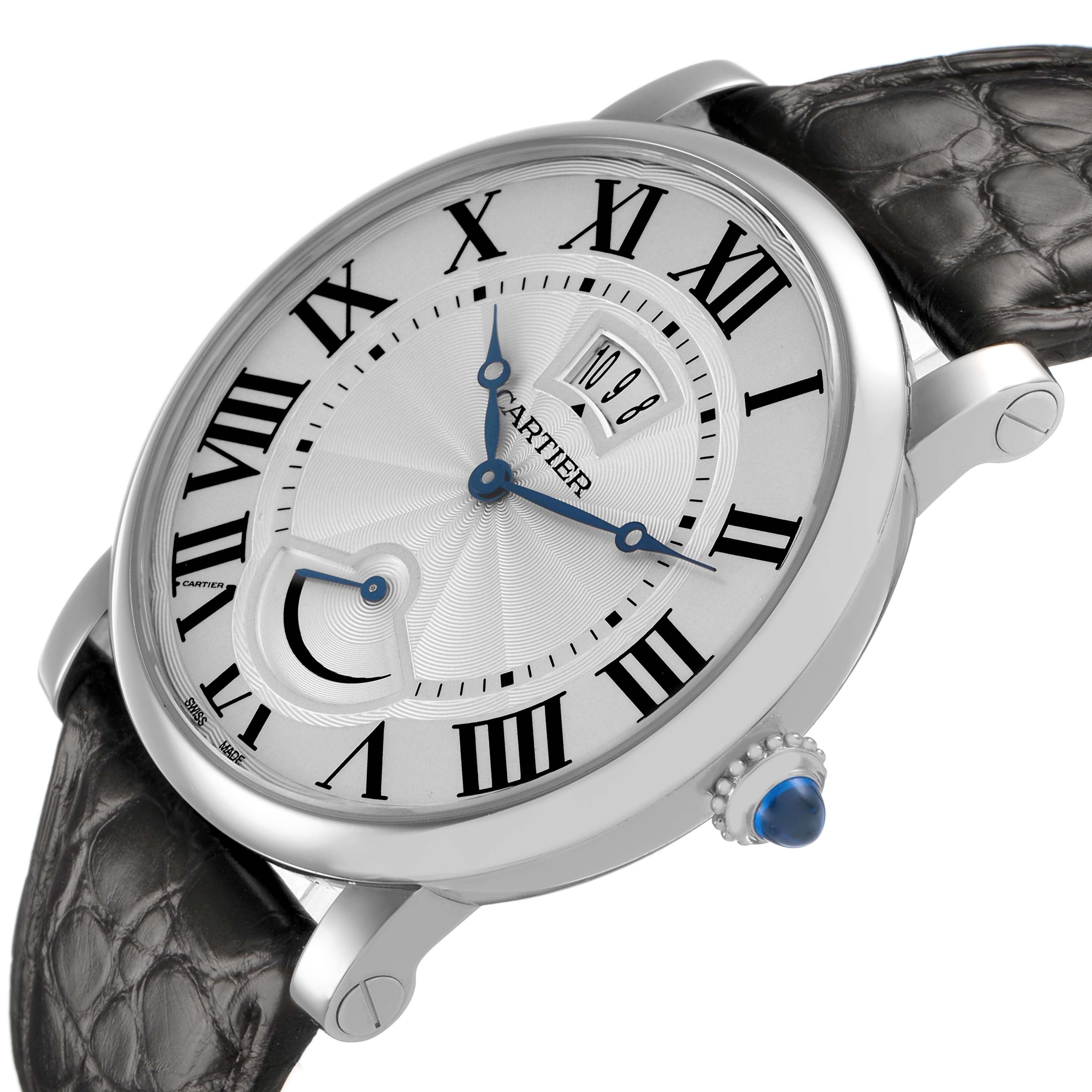 The image shows a Rotonde de Cartier watch at a slight angle, highlighting its Roman numerals, blue hands, date window, and crown.