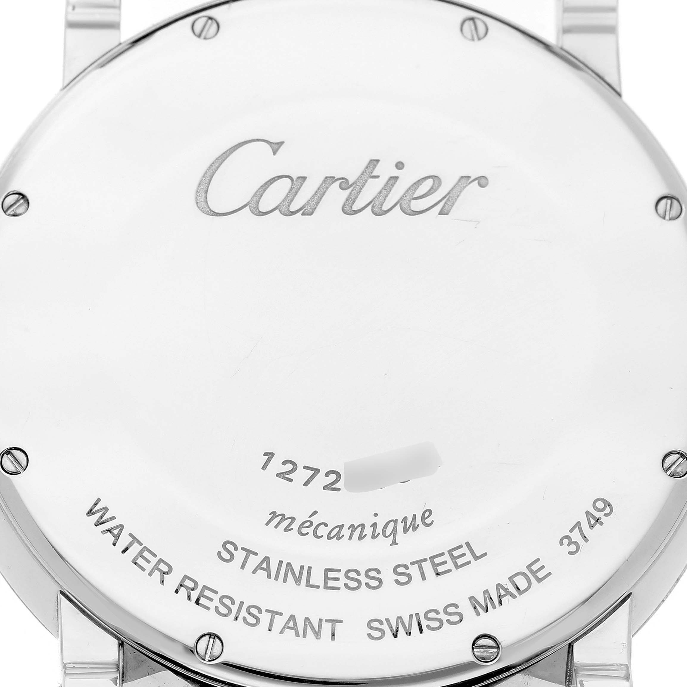 The image shows the back case of a Cartier Rotonde W1556369 Men's Stainless Steel White Dial watch, featuring engravings and screws.