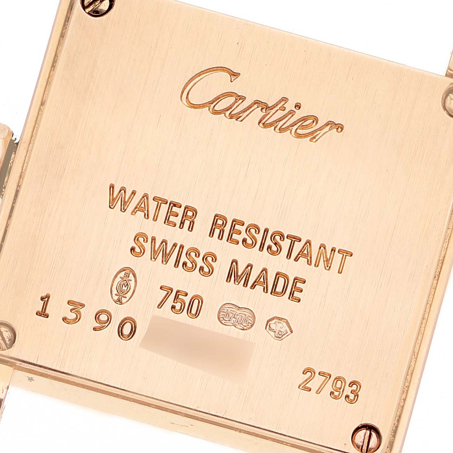 The image shows the back case of a Cartier Tank Francaise WE104531 Women
s Rose Gold Silver Dial WE104531 Women
s Rose Gold Silver Dial watch, highlighting its engravings and hallmarks.