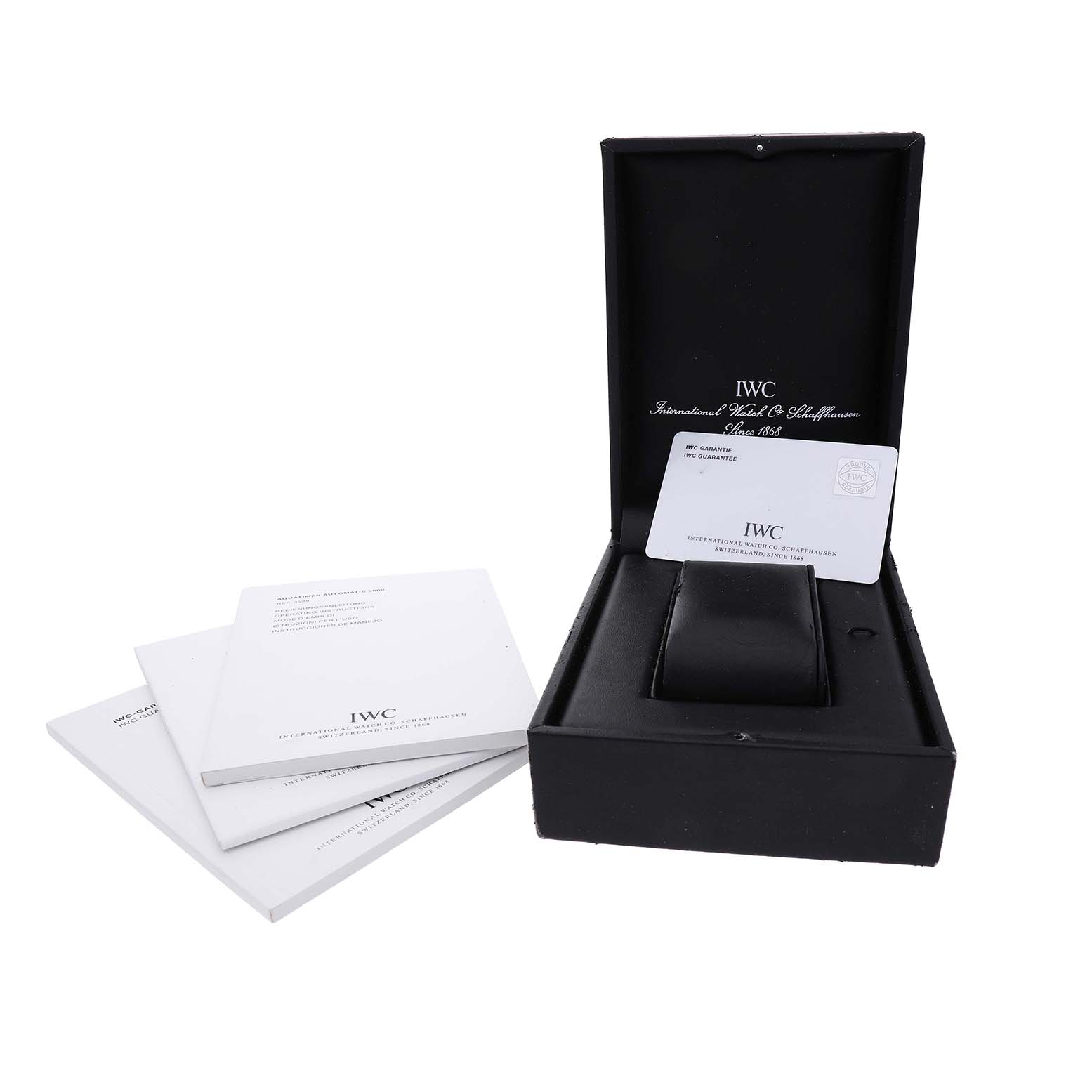 The image shows the IWC Aquatimer IW353803 Men's Titanium Black Dial watch's packaging, including a box, manuals, and a warranty card.