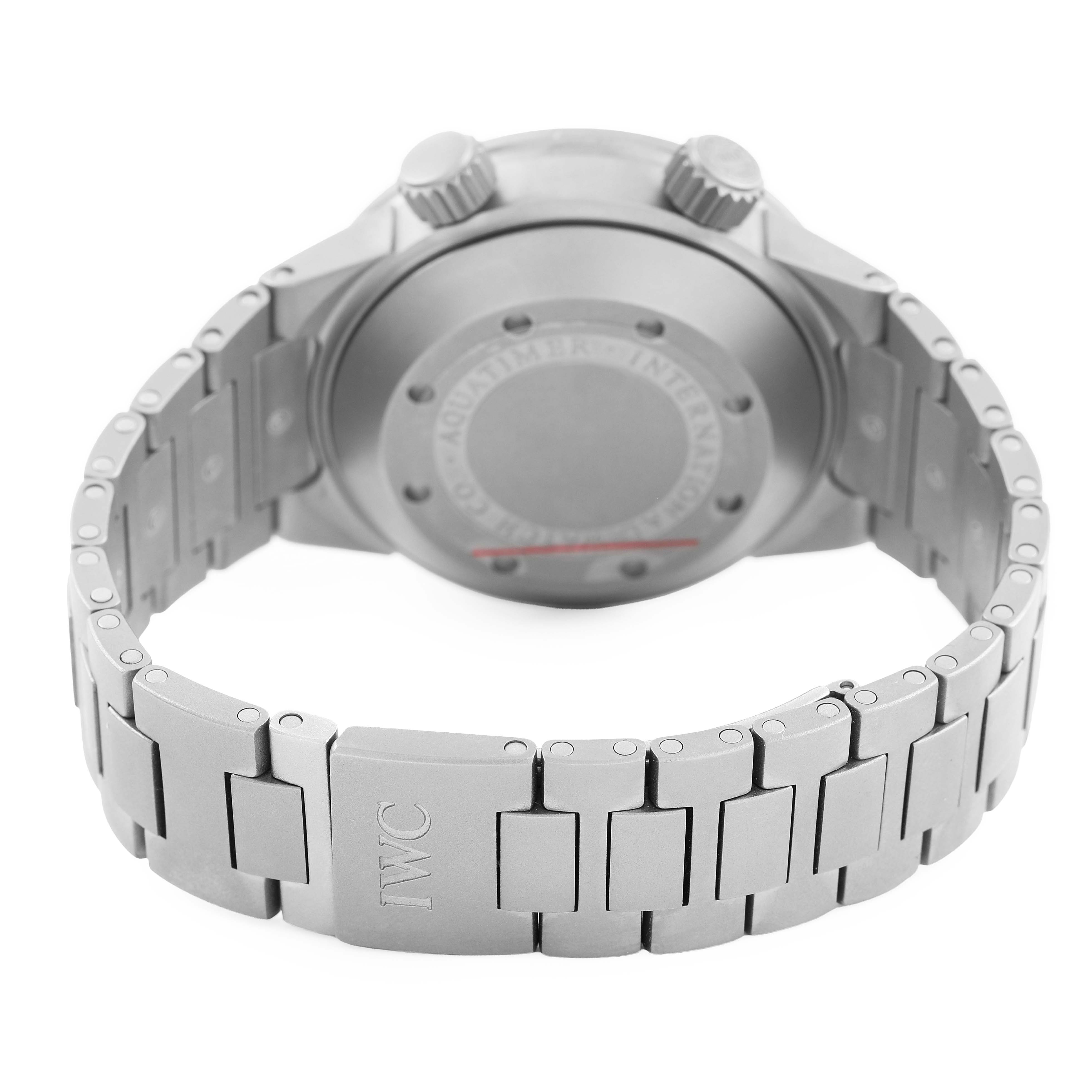 The image shows the back view of an IWC Aquatimer IW353803 Men's Titanium Black Dial watch, highlighting its case back, crown, pushers, and metal bracelet.