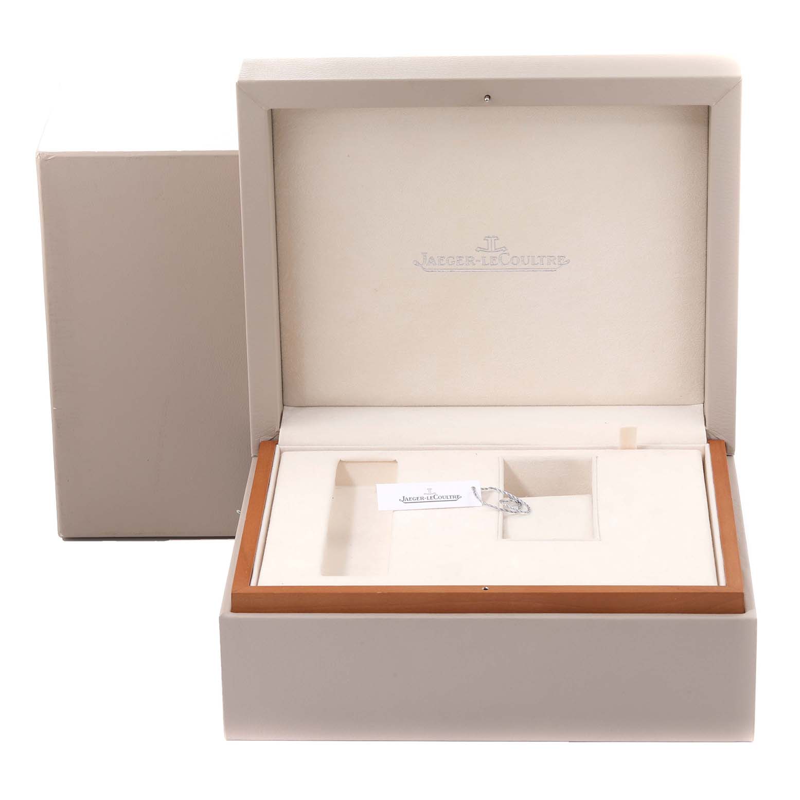 The image shows an open Jaeger LeCoultre Reverso 270.1.54 Men's Yellow Gold Red Dial 270.1.54 Men's Yellow Gold Red Dial watch box, highlighting its interior compartments and branding.