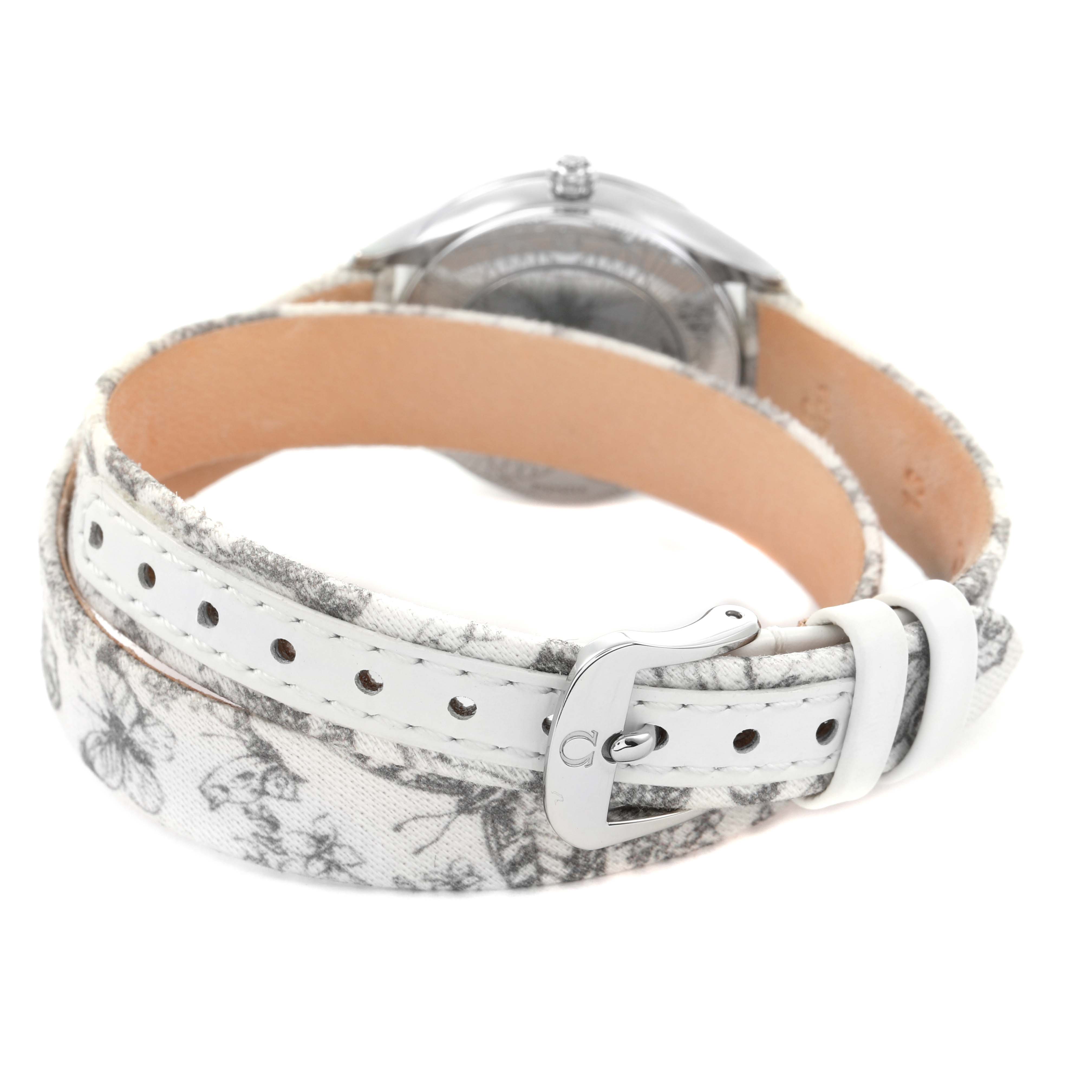 The image shows the Omega 428.17.26.60.04.002 Women's Stainless Steel White Dial DeVille Tresor Mini Butterfly watch from the back, highlighting its strap and buckle details.