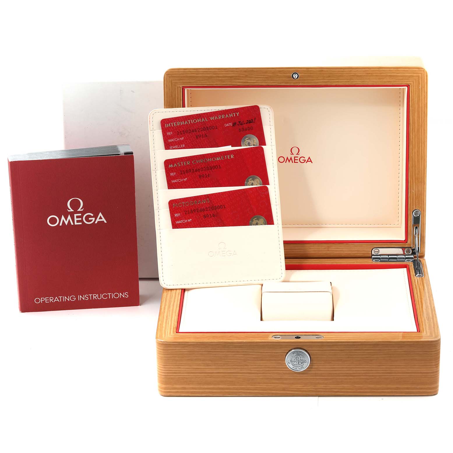 The image shows the accessories of the Omega Planet Ocean 215.92.46.22.03.001 Men's Ceramic Blue Dial 215.92.46.22.03.001 Men's Ceramic Blue Dial watch, including the box, warranty cards, and operating instructions.