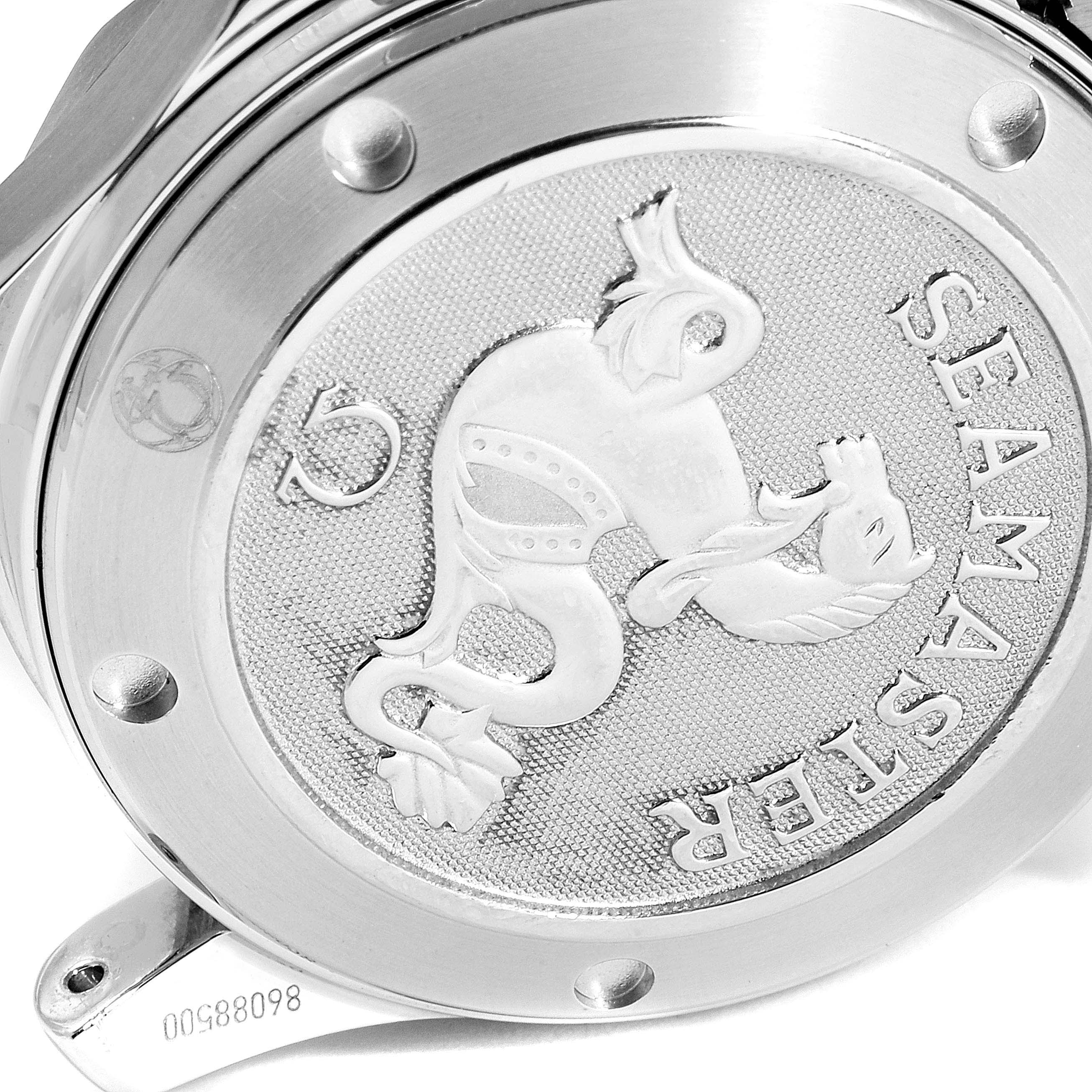 This image shows the engraved caseback of an Omega Seamaster 212.30.36.20.01.001 Men
s Stainless Steel Black Dial 212.30.36.20.01.001 Men
s Stainless Steel Black Dial watch from a low-angle view.