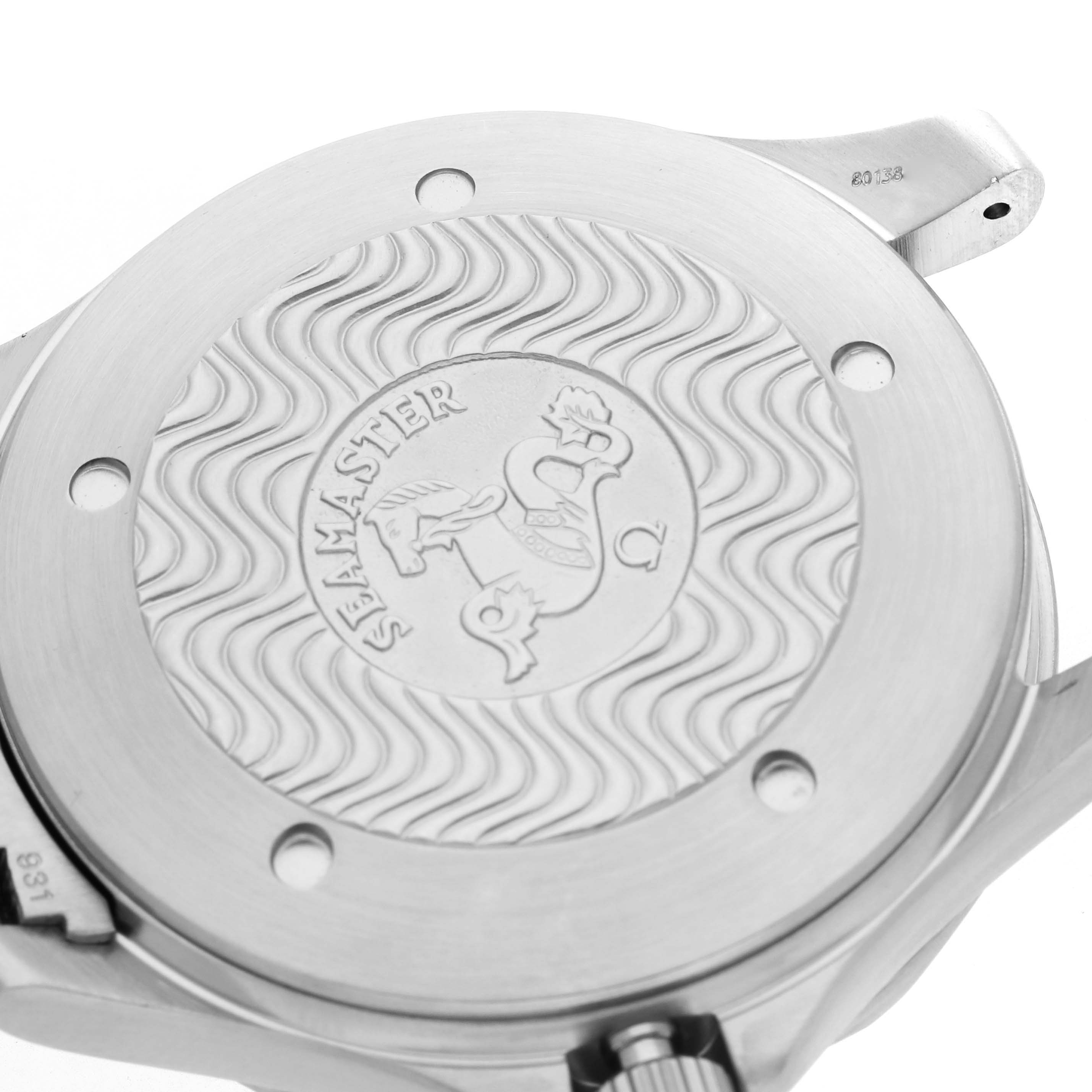 The image shows the case back of an Omega Seamaster 2538.20.00 Men
s Stainless Steel White Dial 2538.20.00 Men
s Stainless Steel White Dial watch at a close-up angle, highlighting its engraved design.